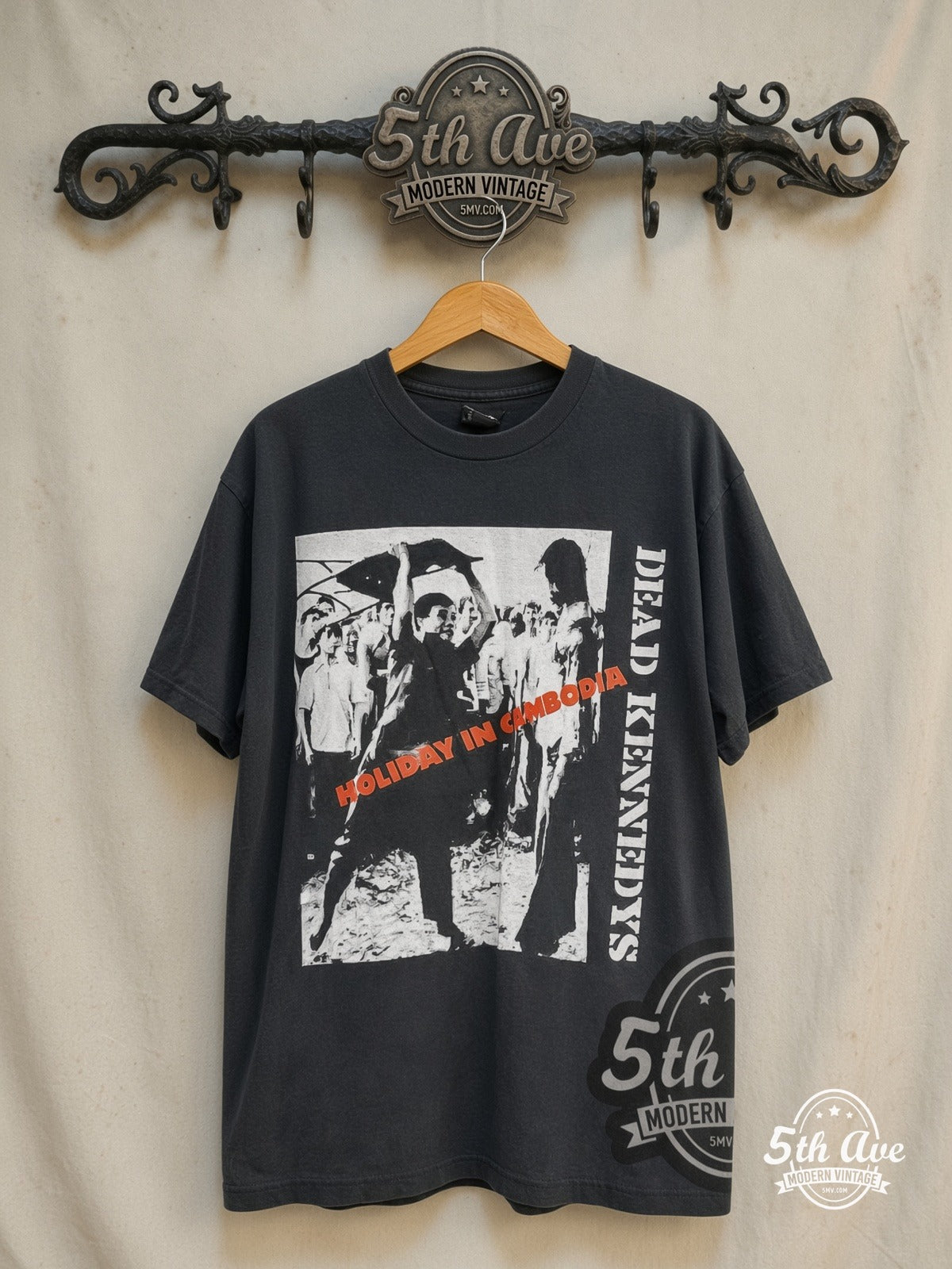 Dead Kennedys – Holiday in Cambodia – Vintage Band T-Shirt — front on locked cream ornate 5th Ave rack