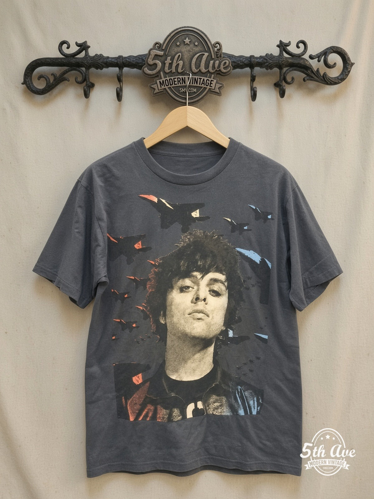 Green Day 100% Cotton Vintage Inspired Band T-Shirt – Vintage Band T-Shirt — front on locked cream ornate 5th Ave rack