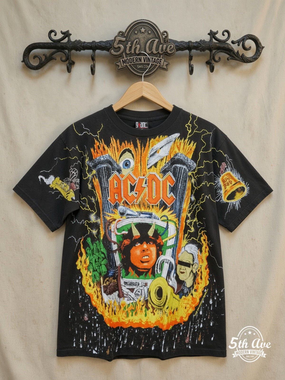 AC/DC Angus Young all-over print vintage band t-shirt on rack
