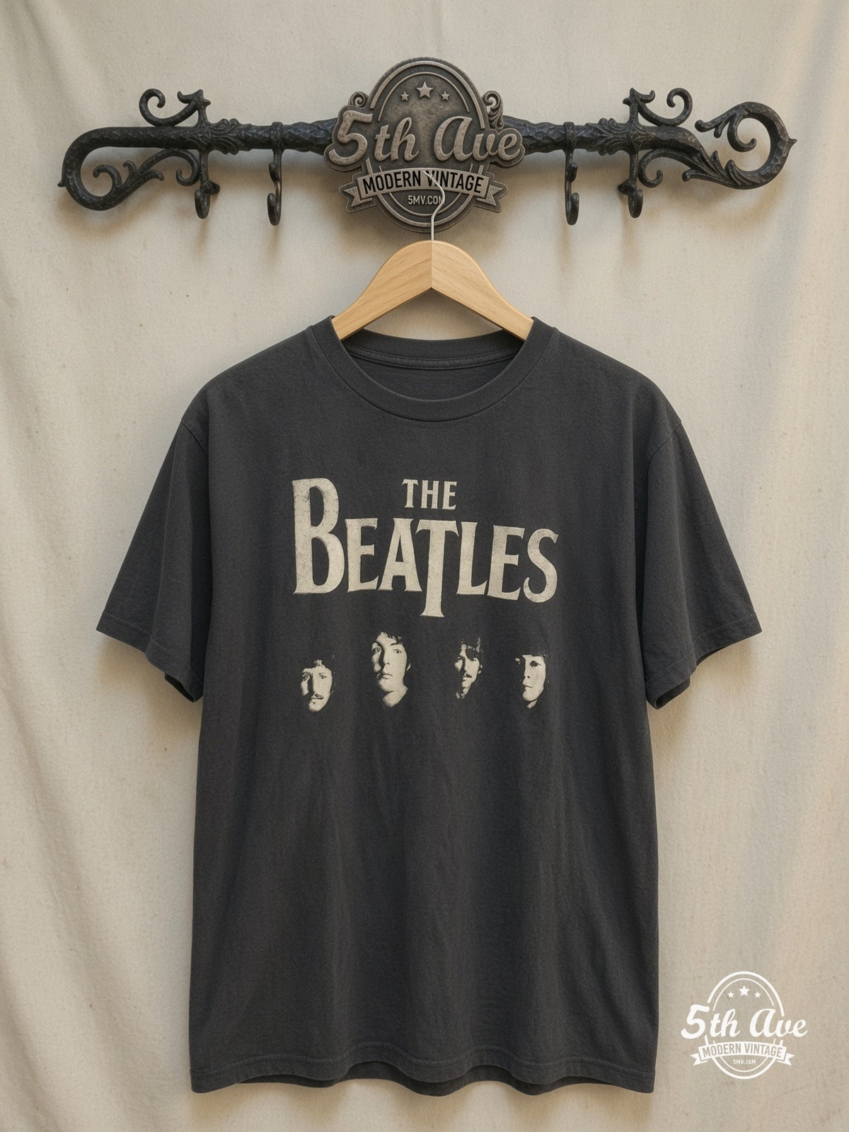 The Beatles – Four Faces Classic Logo – Vintage Band T-Shirt — front on locked cream ornate 5th Ave rack