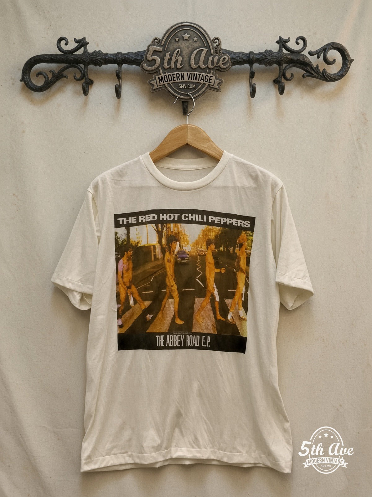 Red Hot Chili Peppers – The Abbey Road E.P. Crossing – Vintage Band T-Shirt — front on locked cream ornate 5th Ave rack