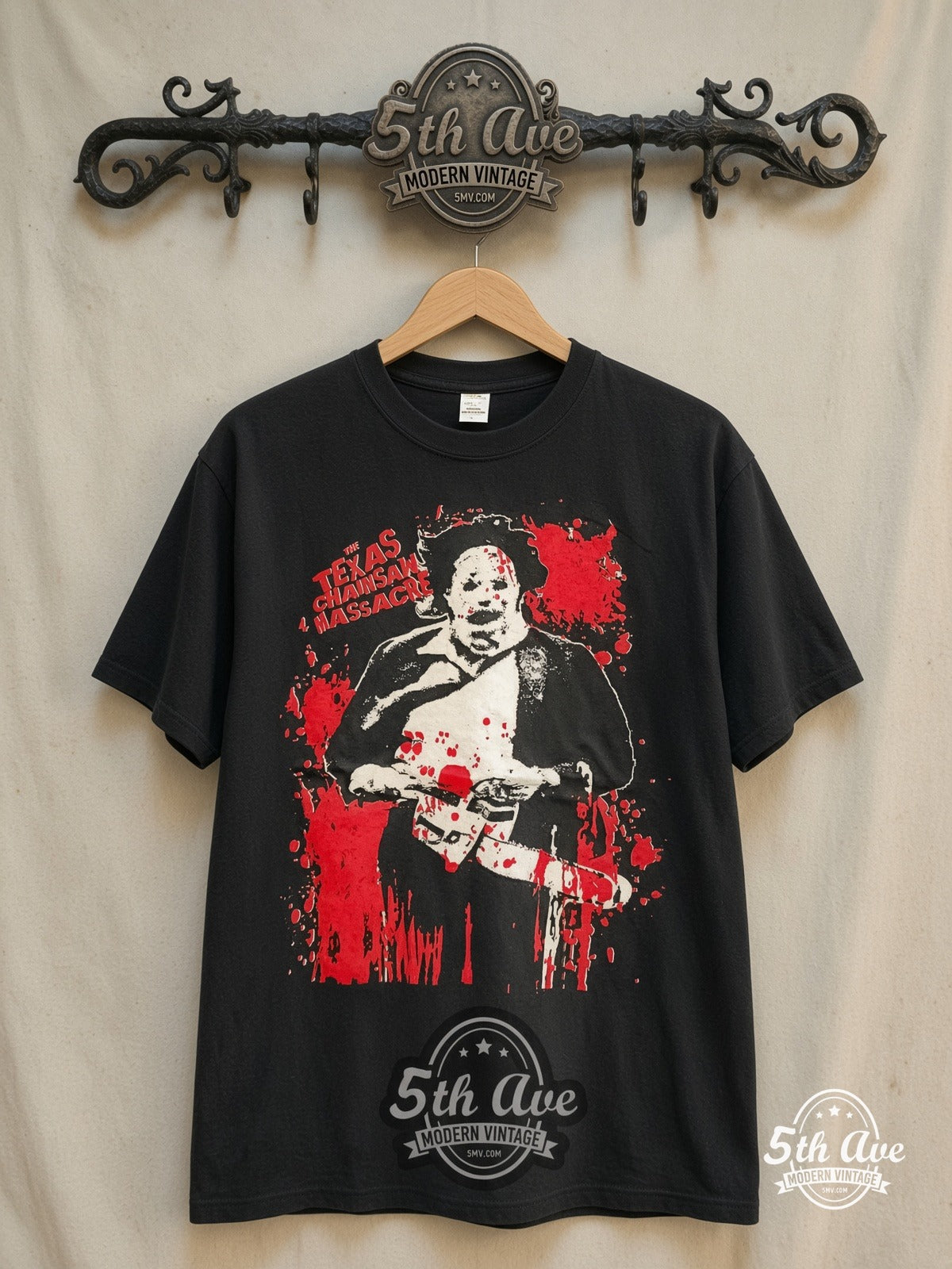 Texas Chainsaw Massacre The Leatherface movie tee in black, front view on a display rack