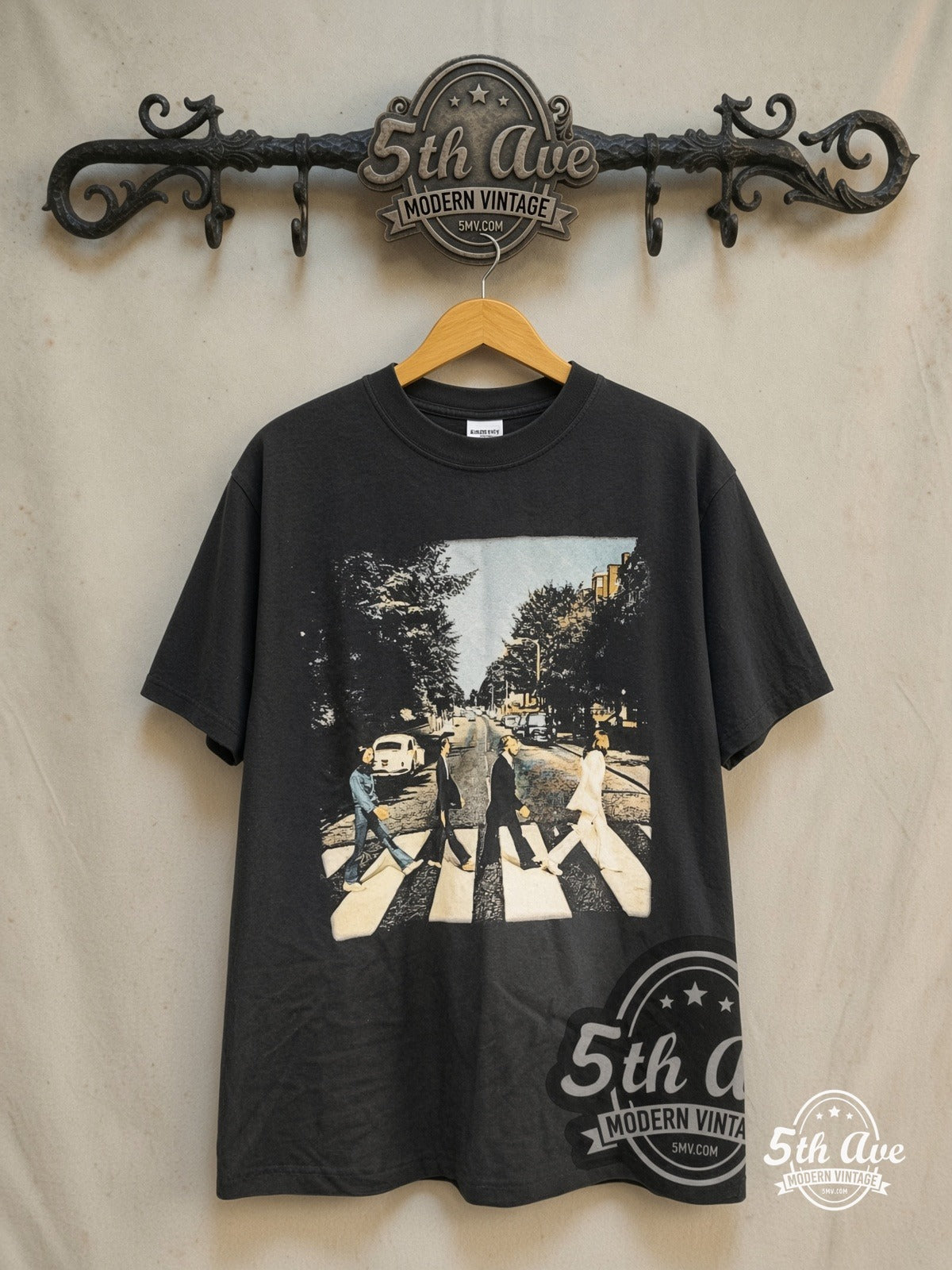 The Beatles – Abbey Road Crossing Wall Sign Back – Vintage Band T-Shirt — front on locked cream ornate 5th Ave rack