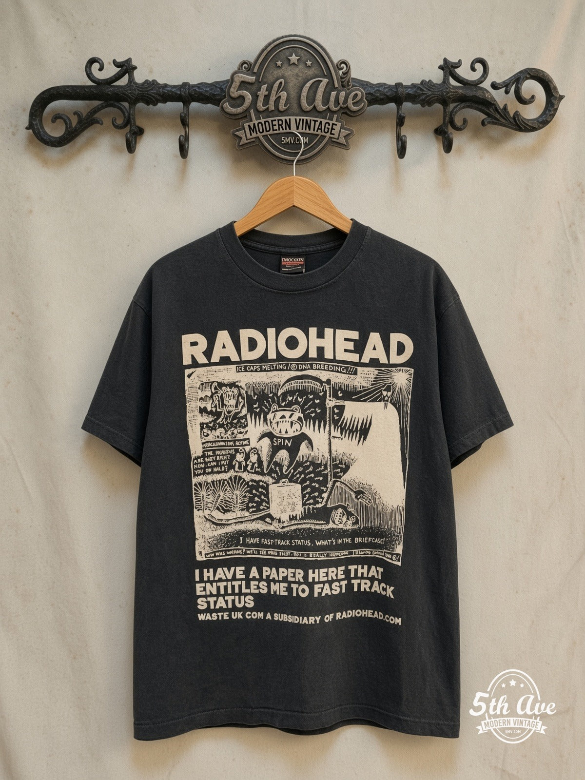Radiohead – Fast Track – Vintage Band T-Shirt — front on locked cream ornate 5th Ave rack