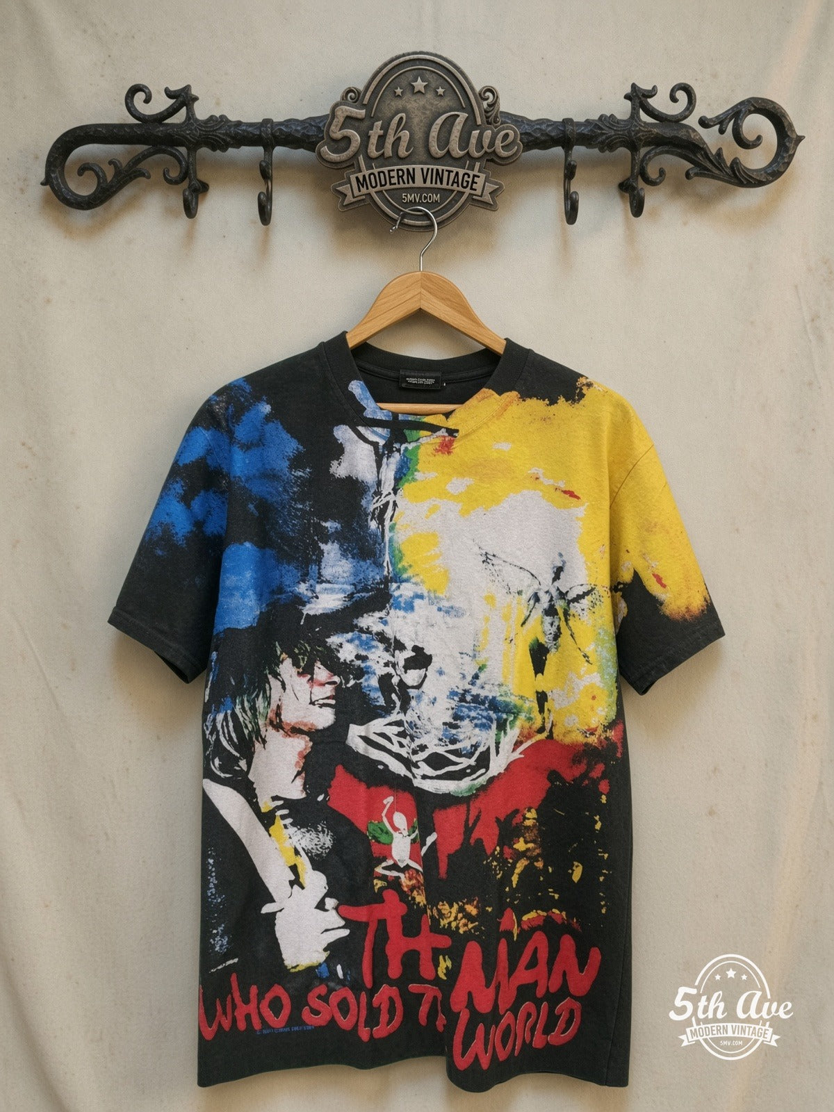 Nirvana – The Man Who Sold the World – All Over Print – Vintage Band T-Shirt — front on locked cream ornate 5th Ave rack