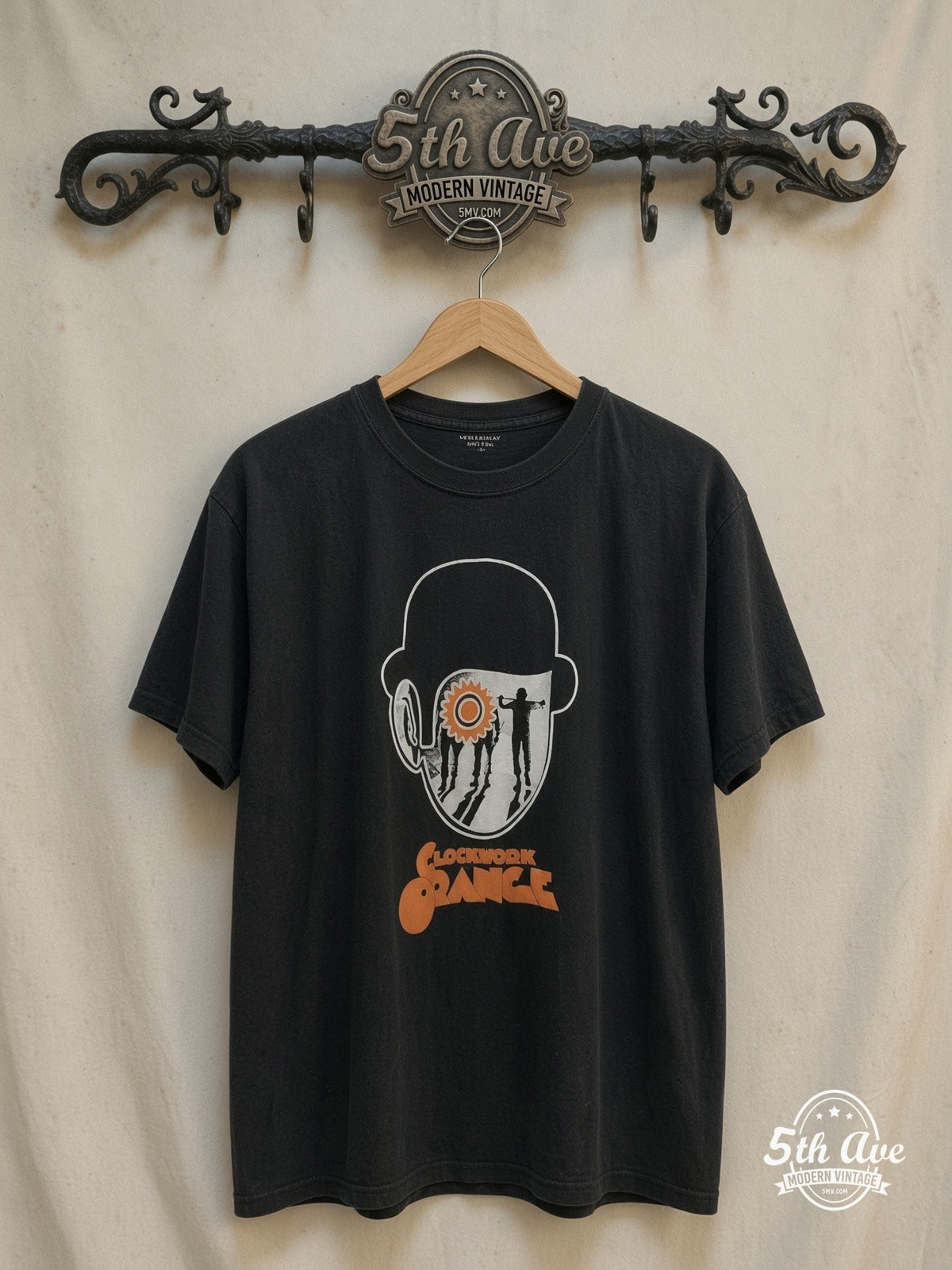 A Clockwork Orange – Bowler Hat Cog Eye Droogs Poster – Vintage Movie Tee — front on locked cream ornate 5th Ave rack