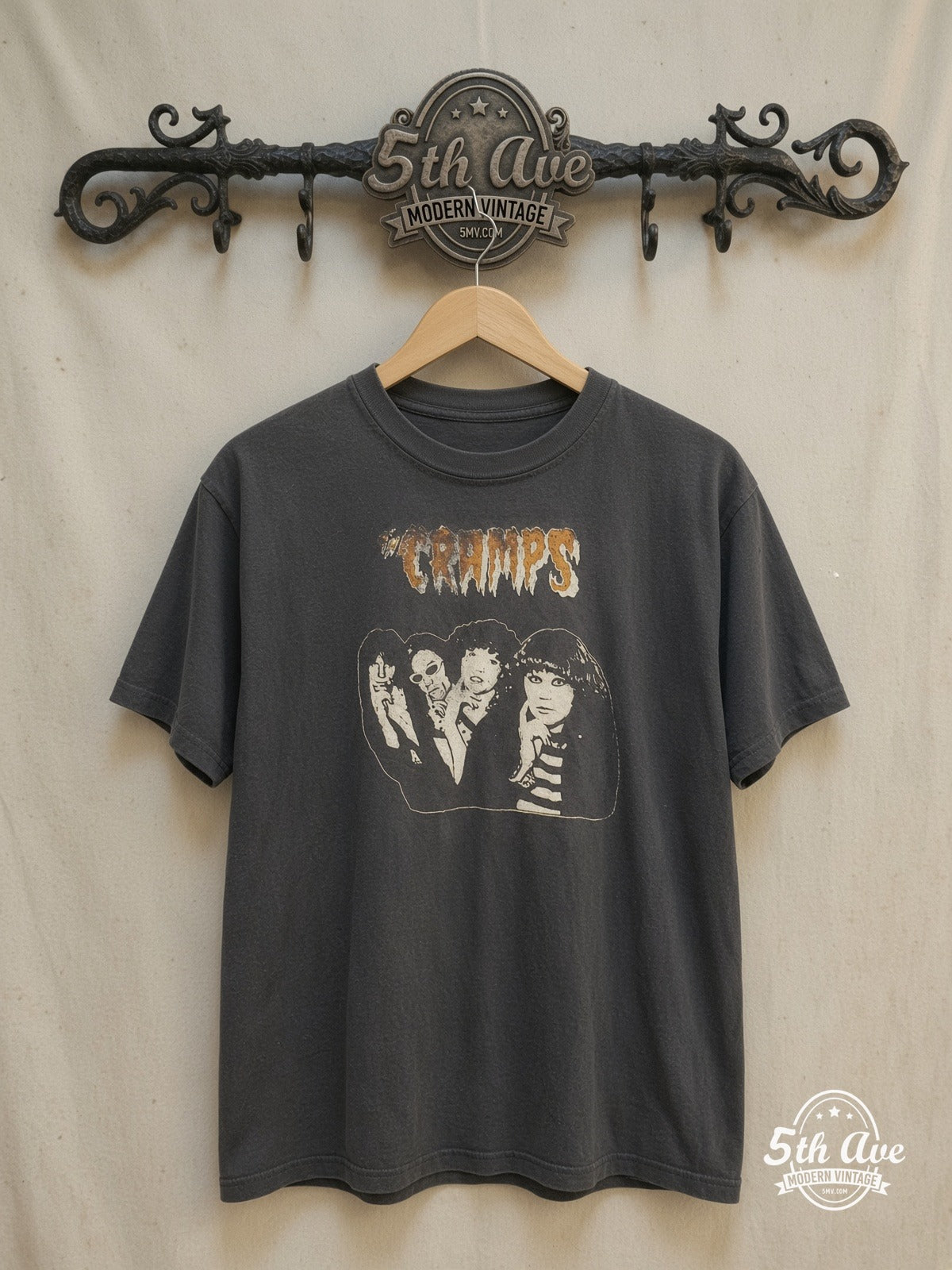 THE CRAMPS 100% Cotton New Vintage Band T-Shirt – Vintage Band T-Shirt — front on locked cream ornate 5th Ave rack