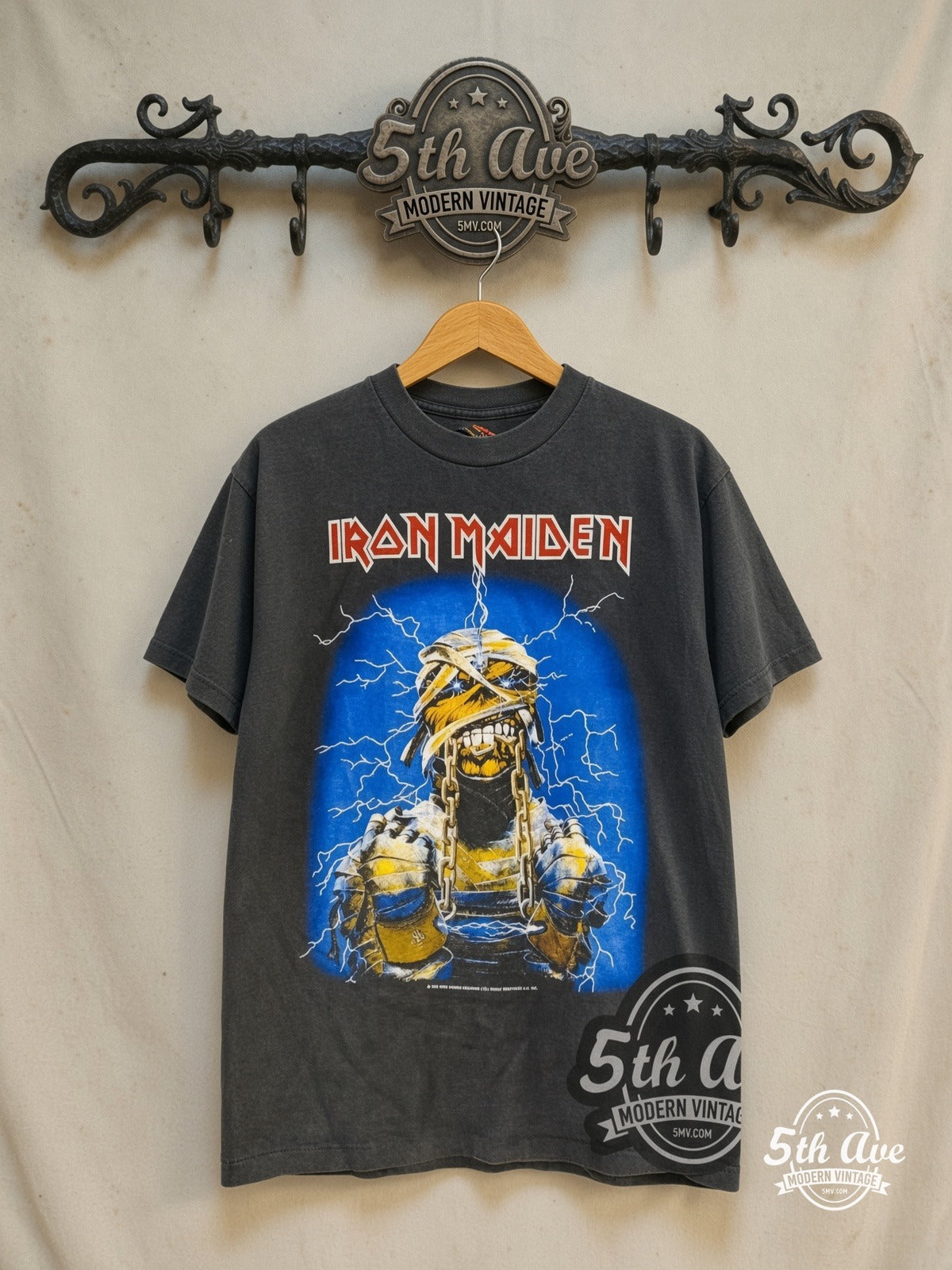 Iron Maiden – World Slavery Tour' 1984/85 – Vintage Band T-Shirt — front on locked cream ornate 5th Ave rack