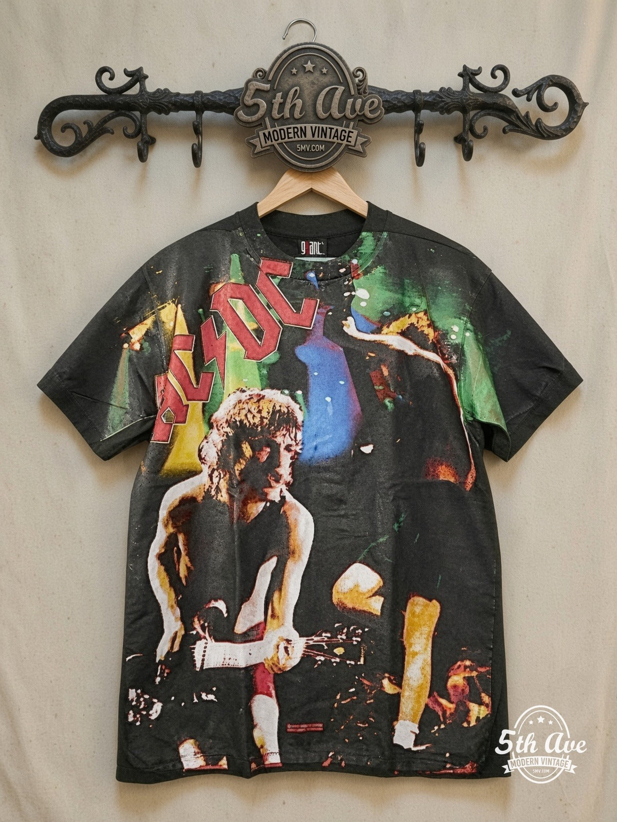 AC/DC – s Angus Young Shreds in All-Over Print Tee – Vintage Band T-Shirt — front on locked cream ornate 5th Ave rack