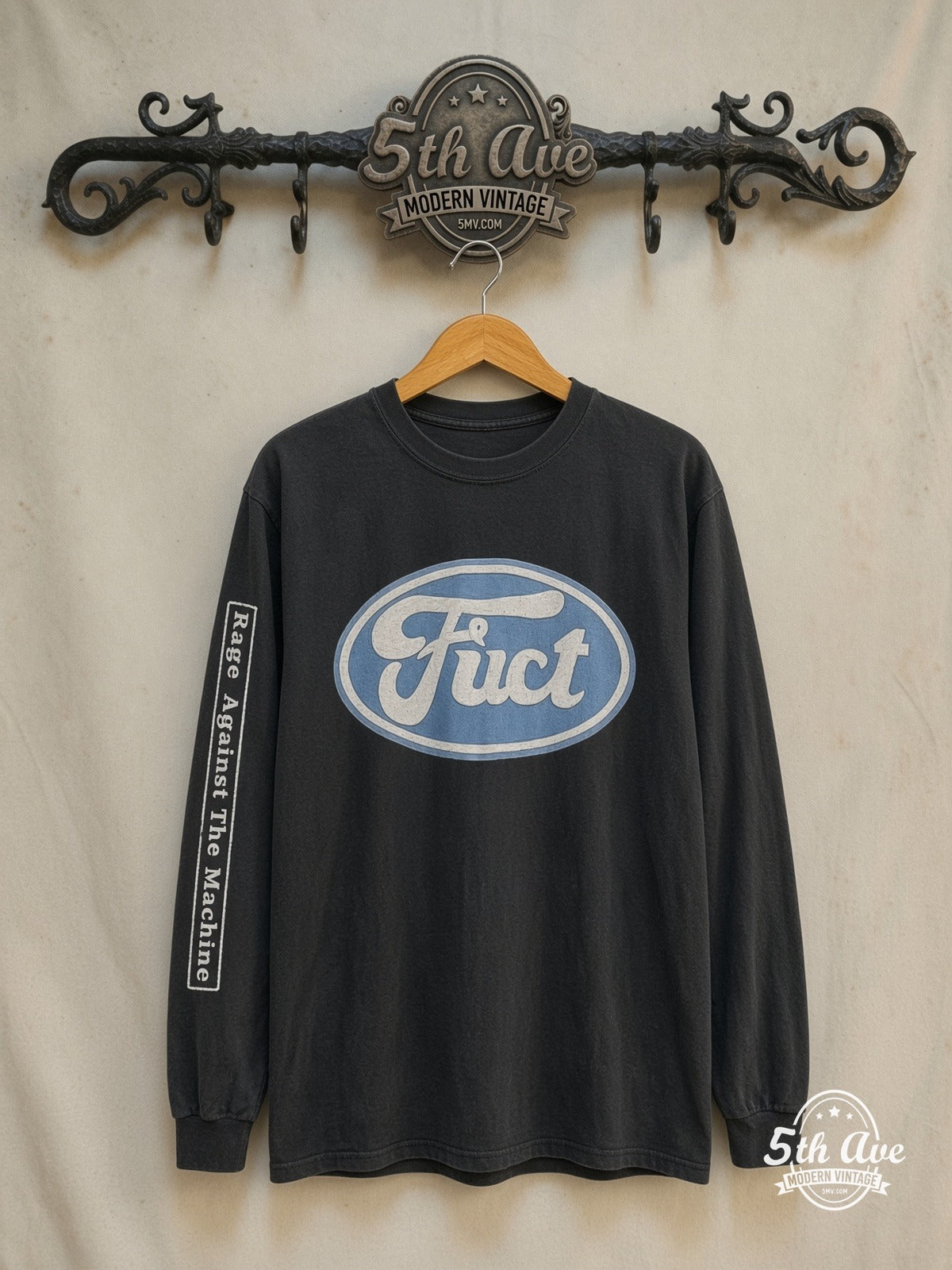 Rage Against the Machine – x FUCT Ford Oval – Vintage Band T-Shirt — front on locked cream ornate 5th Ave rack