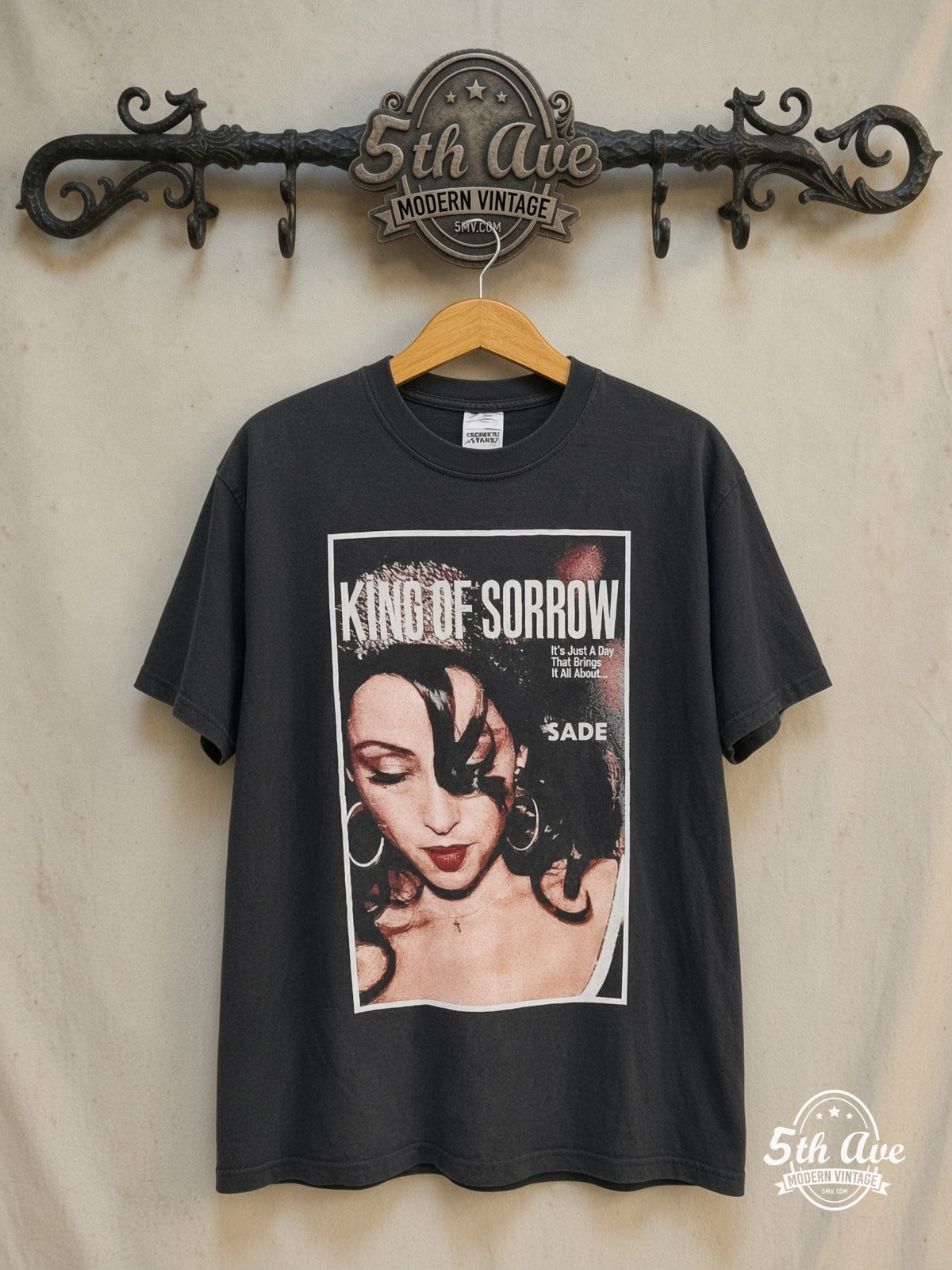 Sade – King of Sorrow – Vintage Band T-Shirt — front on locked cream ornate 5th Ave rack
