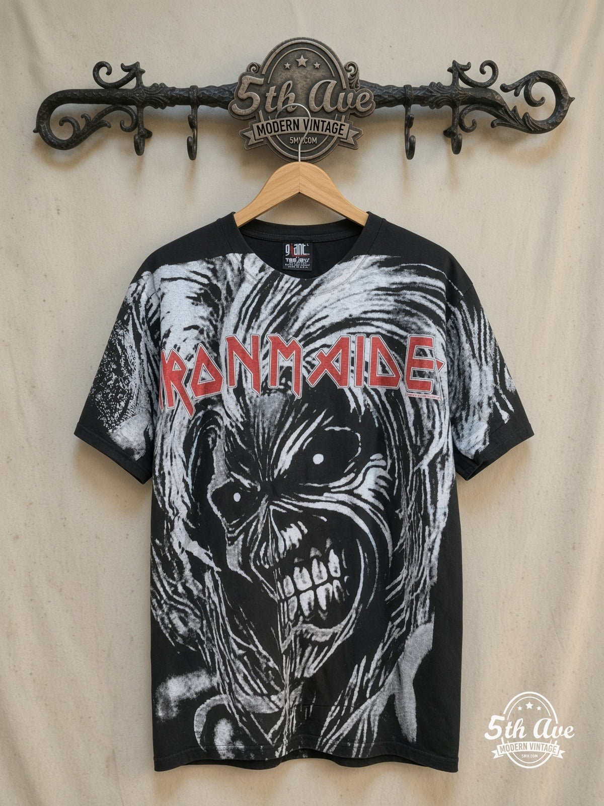 Iron Maiden – Killers Oversized Debut Eddie Face All Over Print – Vintage Band T-Shirt — front on locked cream ornate 5th Ave rack