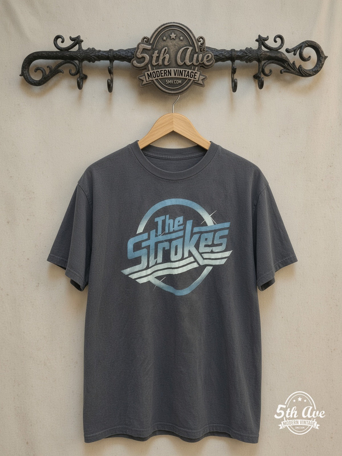 The Strokes – Vintage Band T-Shirt — front on locked cream ornate 5th Ave rack