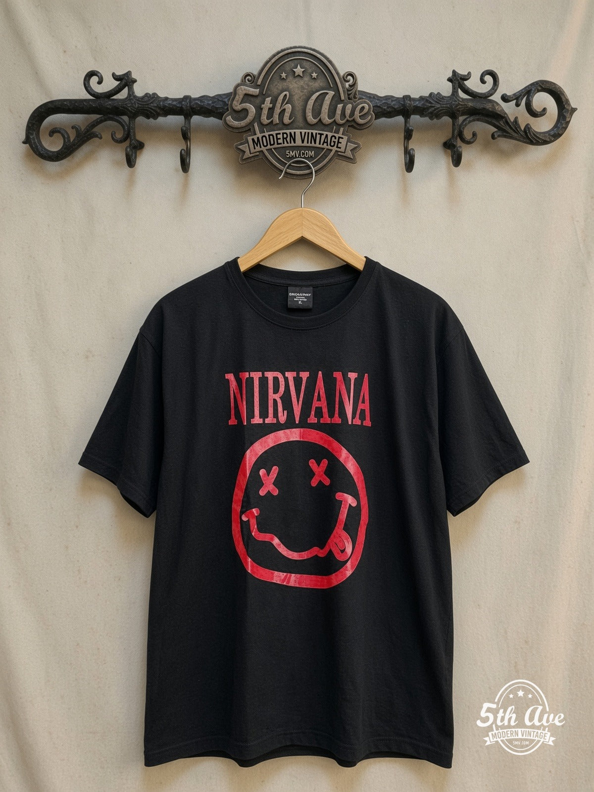 Nirvana – Red Smiley Face Logo – Vintage Band T-Shirt — front on locked cream ornate 5th Ave rack