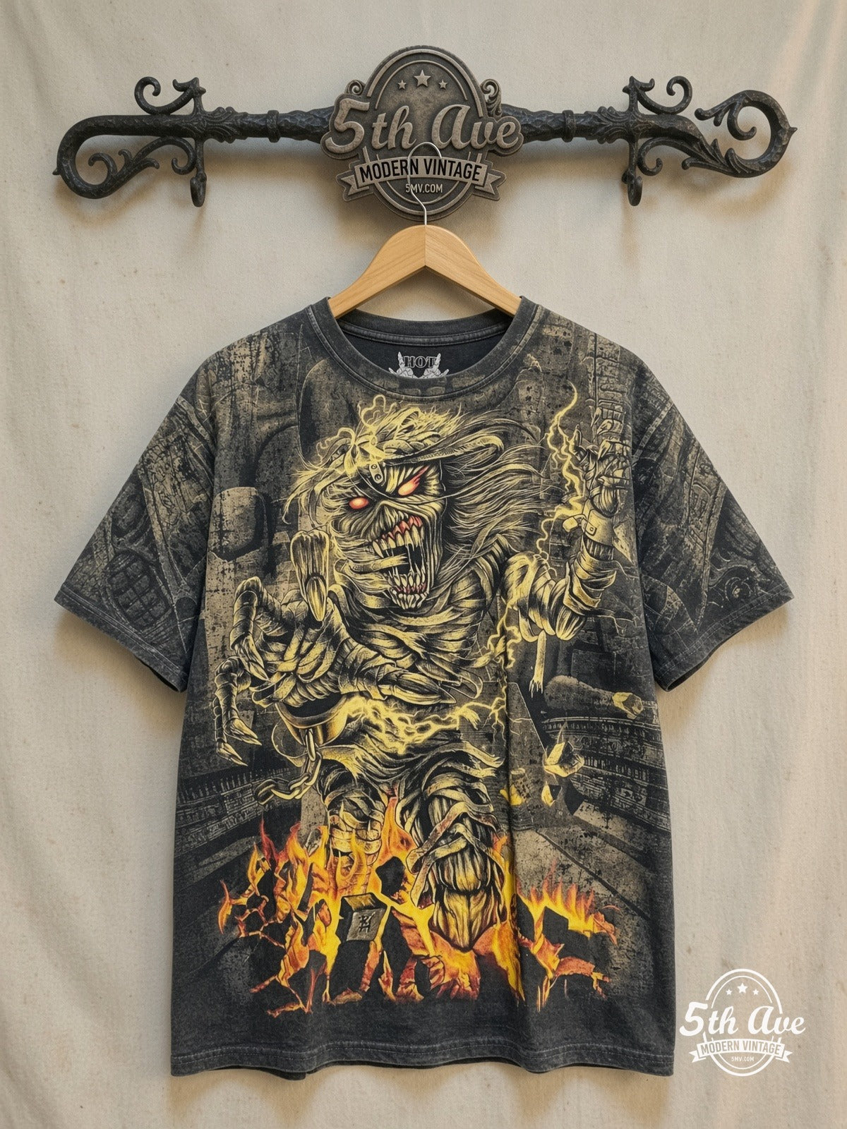Iron Maiden – Somewhere Back in Time – All Over Print – Vintage Band T-Shirt — front on locked cream ornate 5th Ave rack