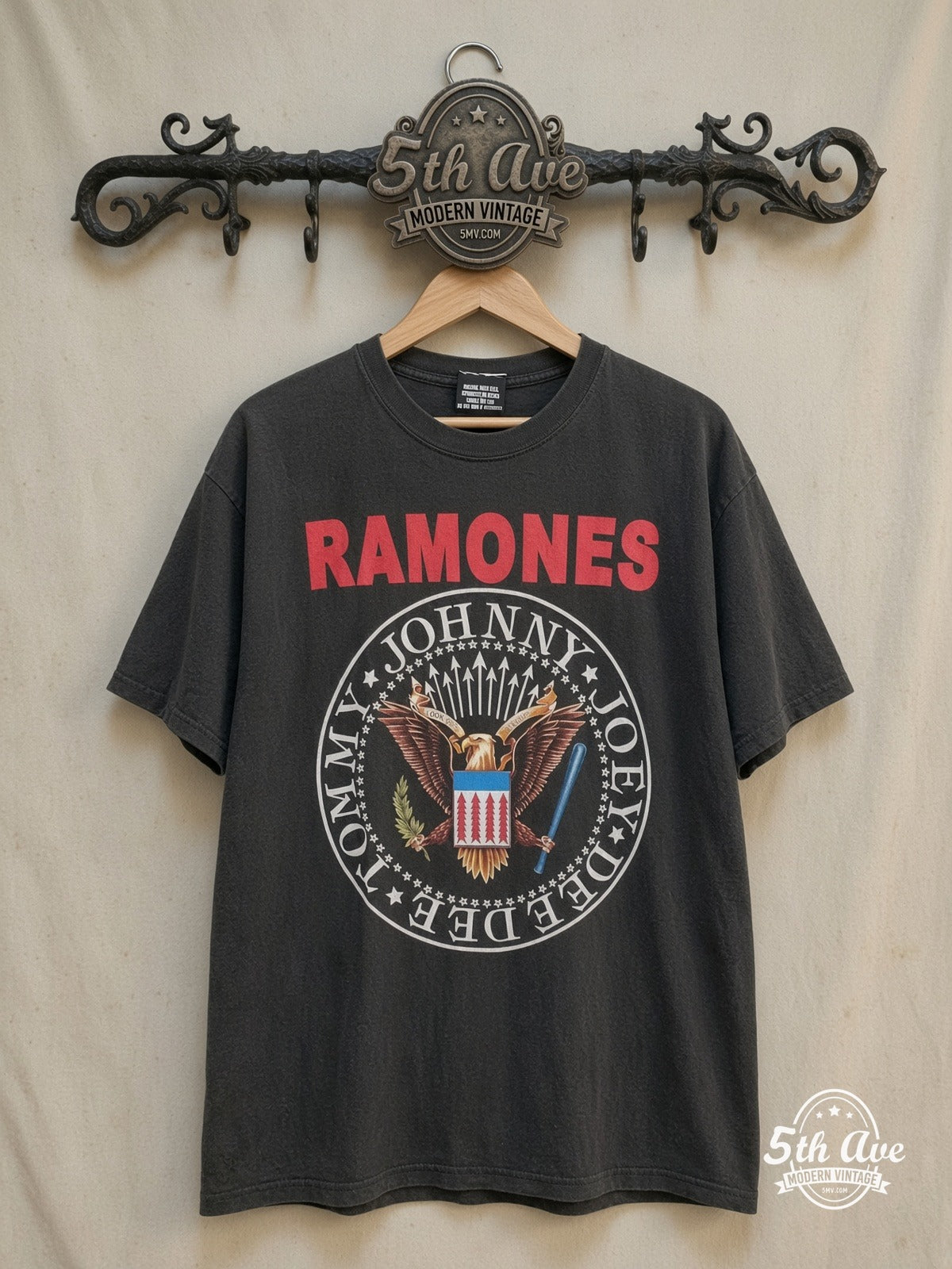Ramones Presidential Seal t shirt: A Punk Rock Icon – Vintage Band T-Shirt — front on locked cream ornate 5th Ave rack