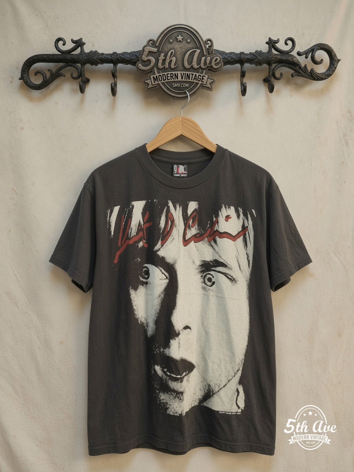 Nirvana – Kurt Cobain Shock Collage – Vintage Band T-Shirt — front on locked cream ornate 5th Ave rack
