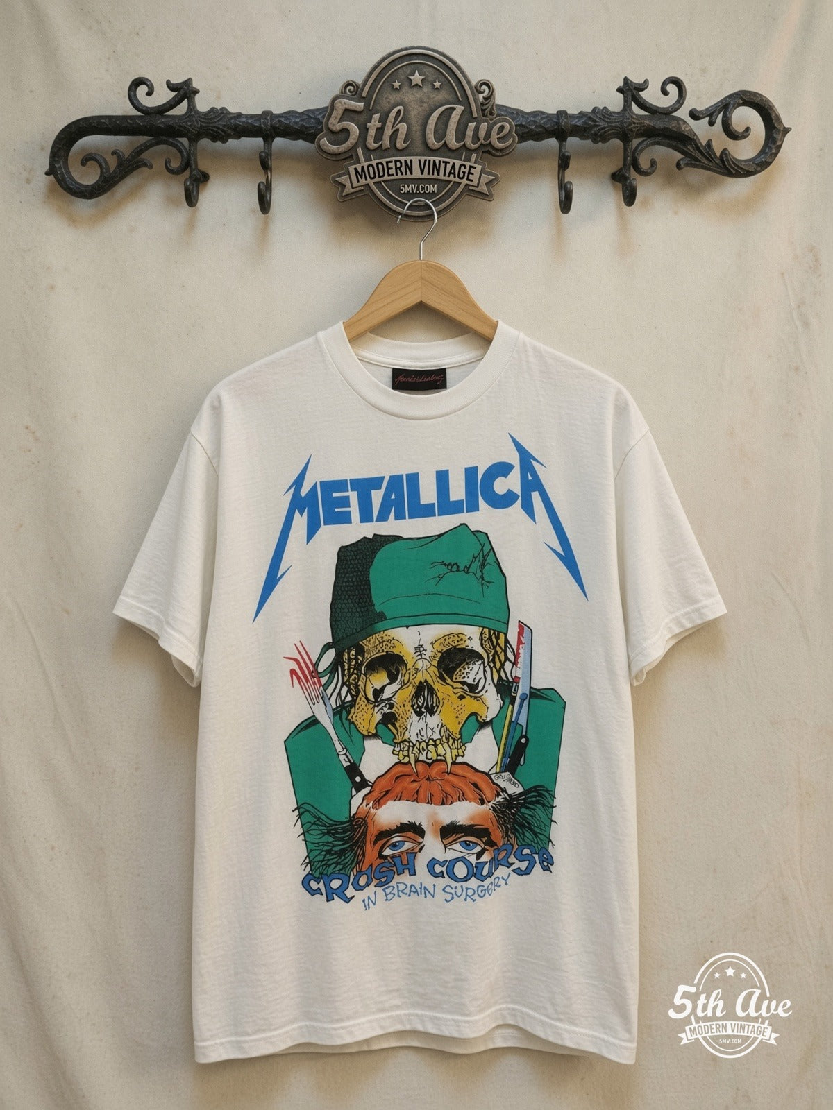 Metallica – Crash Course in Brain Surgery – Vintage Band T-Shirt front on locked cream ornate 5th Ave rack