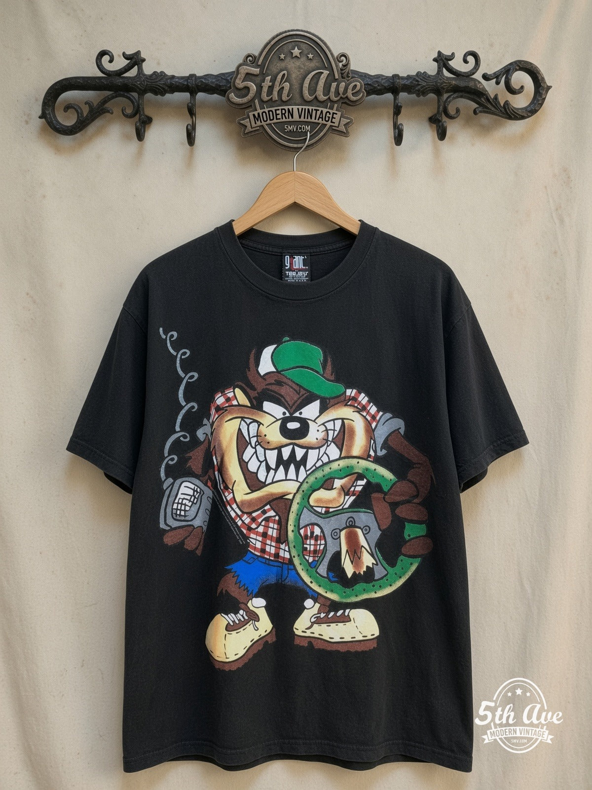 Looney Tunes – Taz's Truckin' Co. – New Vintage Graphic Tee — front on locked cream ornate 5th Ave rack