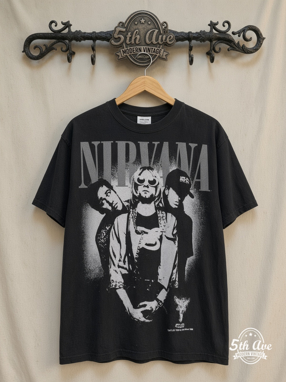 Nirvana – Pink Stencil In Utero Bootleg 1993 – Vintage Band T-Shirt — front on locked cream ornate 5th Ave rack