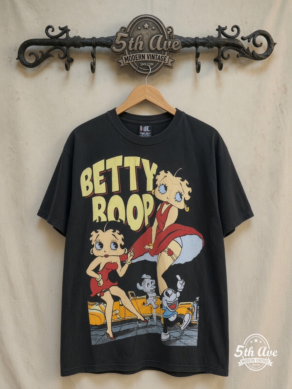 Betty Boop – What Would You Like to Order – All Over Print – New Vintage Graphic Tee — front on locked cream ornate 5th Ave rack