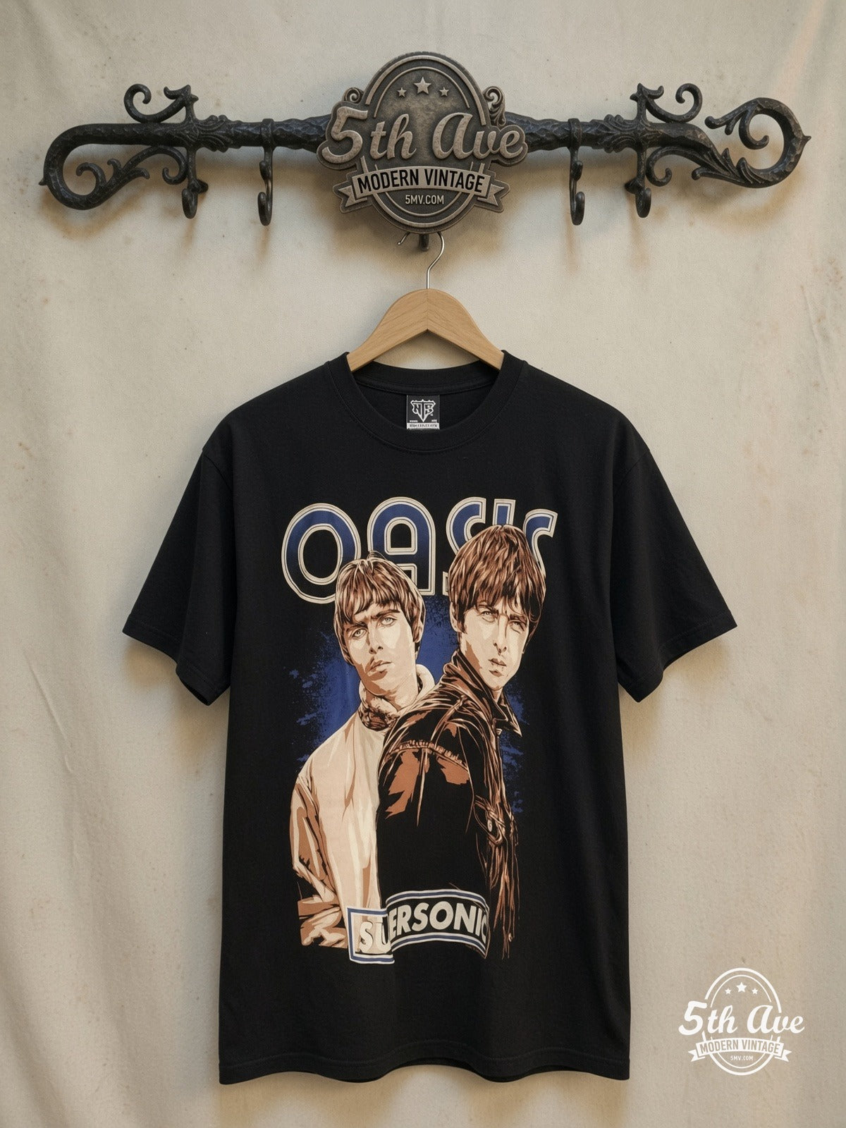 Oasis – Champagne Supernova / Supersonic – Vintage Band T-Shirt — front on locked cream ornate 5th Ave rack