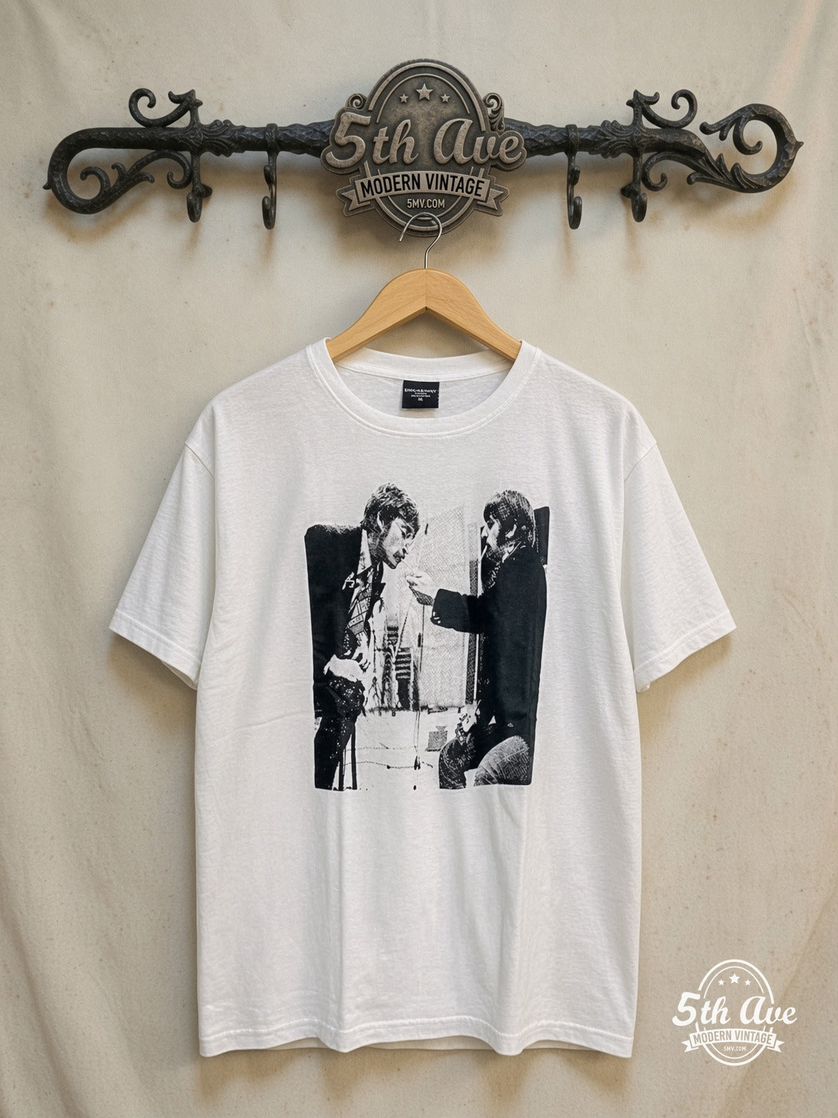 The Beatles – Cigarettes – Vintage Band T-Shirt — front on locked cream ornate 5th Ave rack