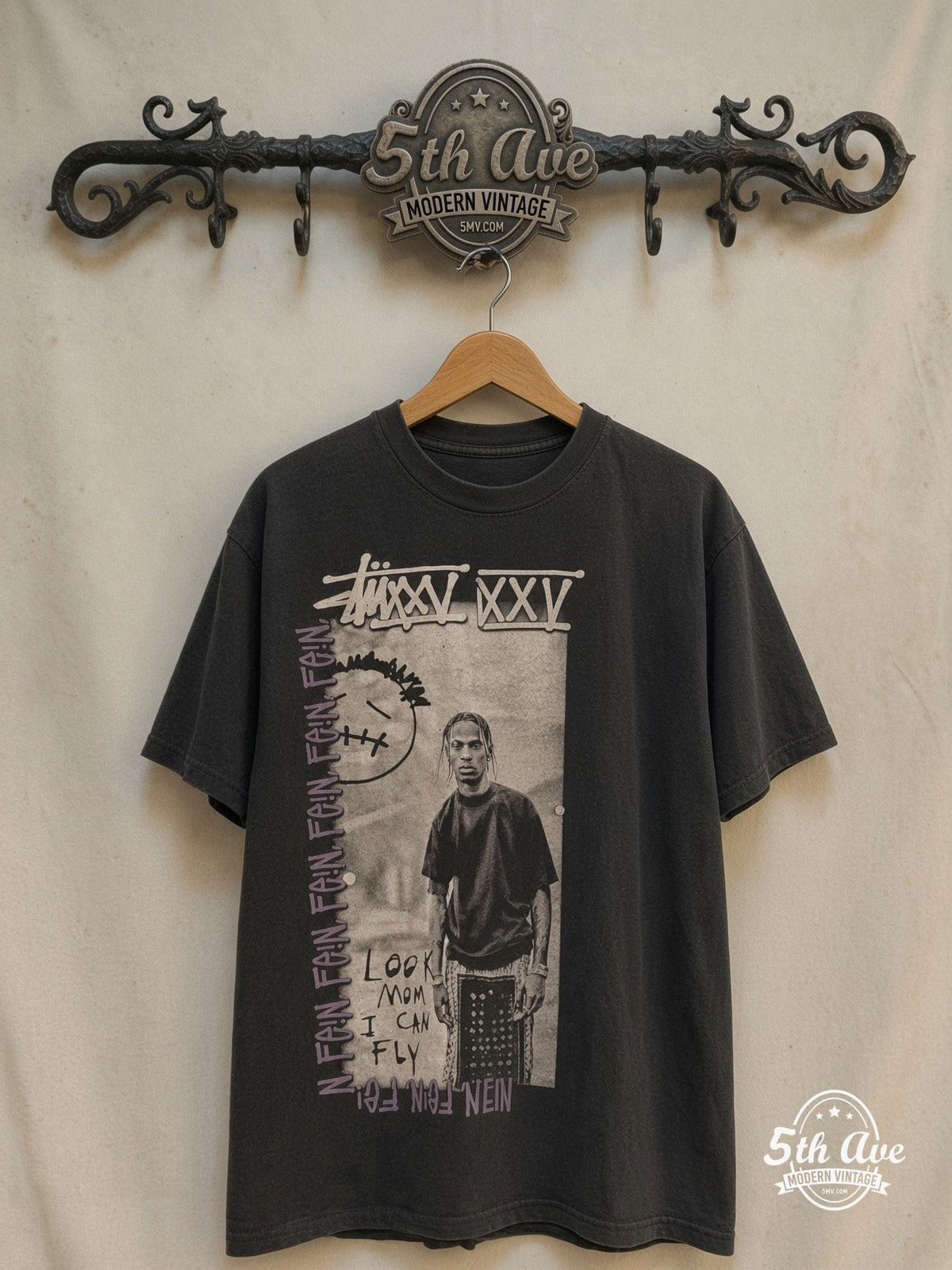 Travis Scott × Stüssy – FEIN / Cactus Jack – Vintage Band T-Shirt — front on locked cream ornate 5th Ave rack