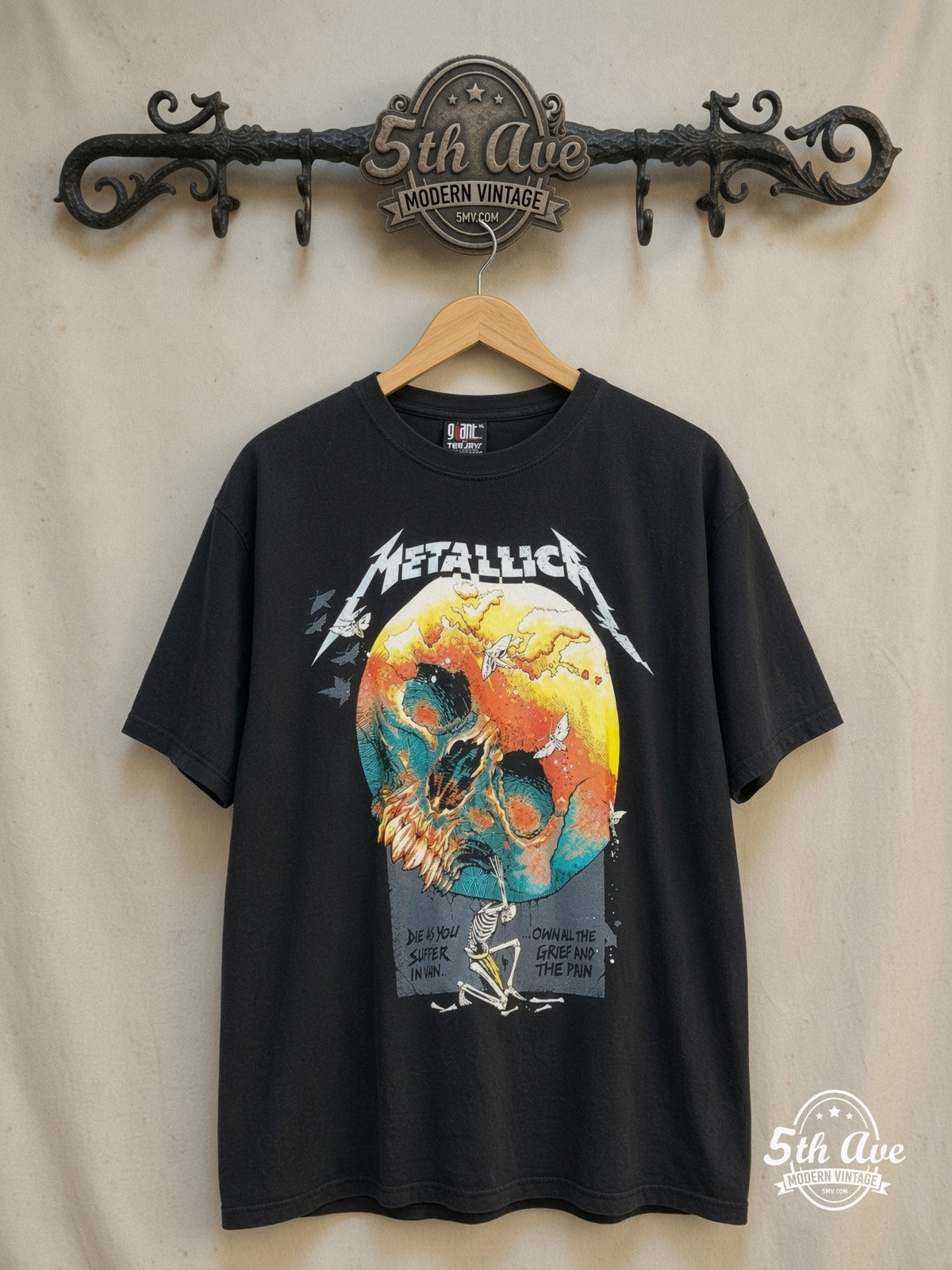 Metallica – Atlas, Rise! – Vintage Band T-Shirt — front on locked cream ornate 5th Ave rack