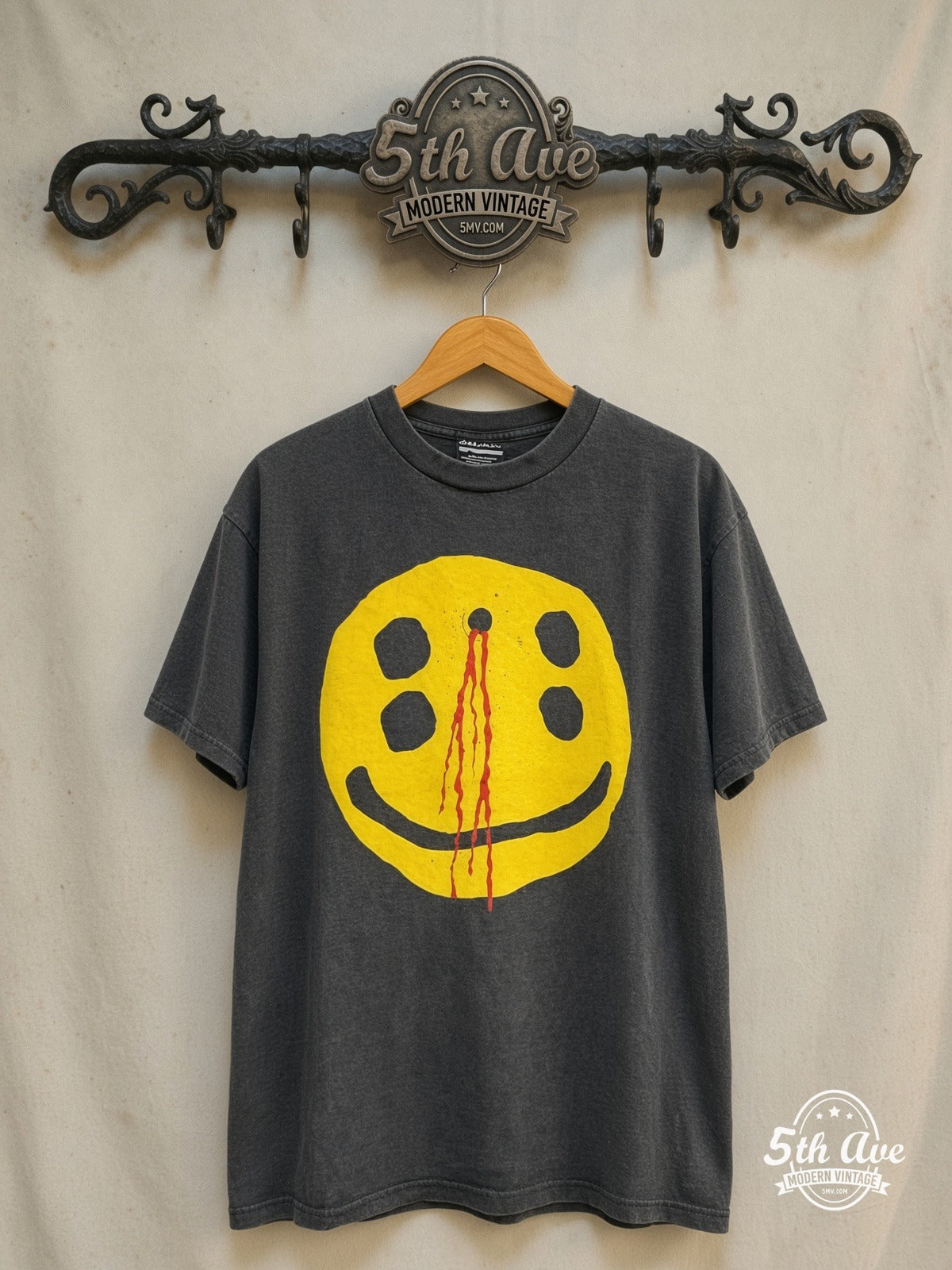 Cactus Plant Flea Market – Headshot – Vintage Graphic Tee — front on locked cream ornate 5th Ave rack
