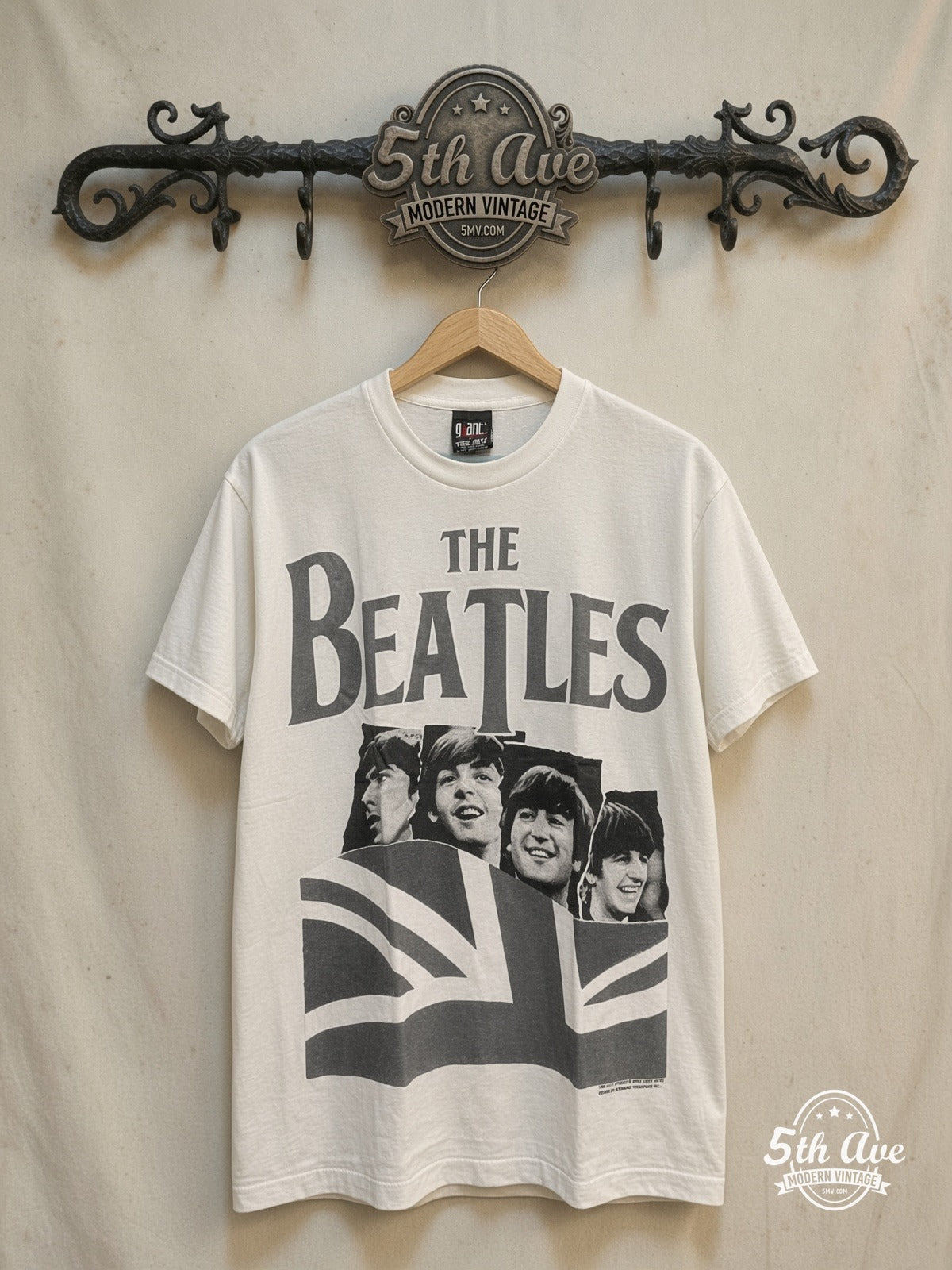 The Beatles – Union Jack Red Logo White Tee – Vintage Band T-Shirt — front on locked cream ornate 5th Ave rack