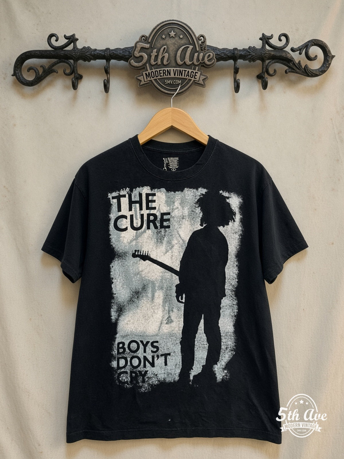 The Cure – Boys Don't Cry – Vintage Band T-Shirt — front on locked cream ornate 5th Ave rack