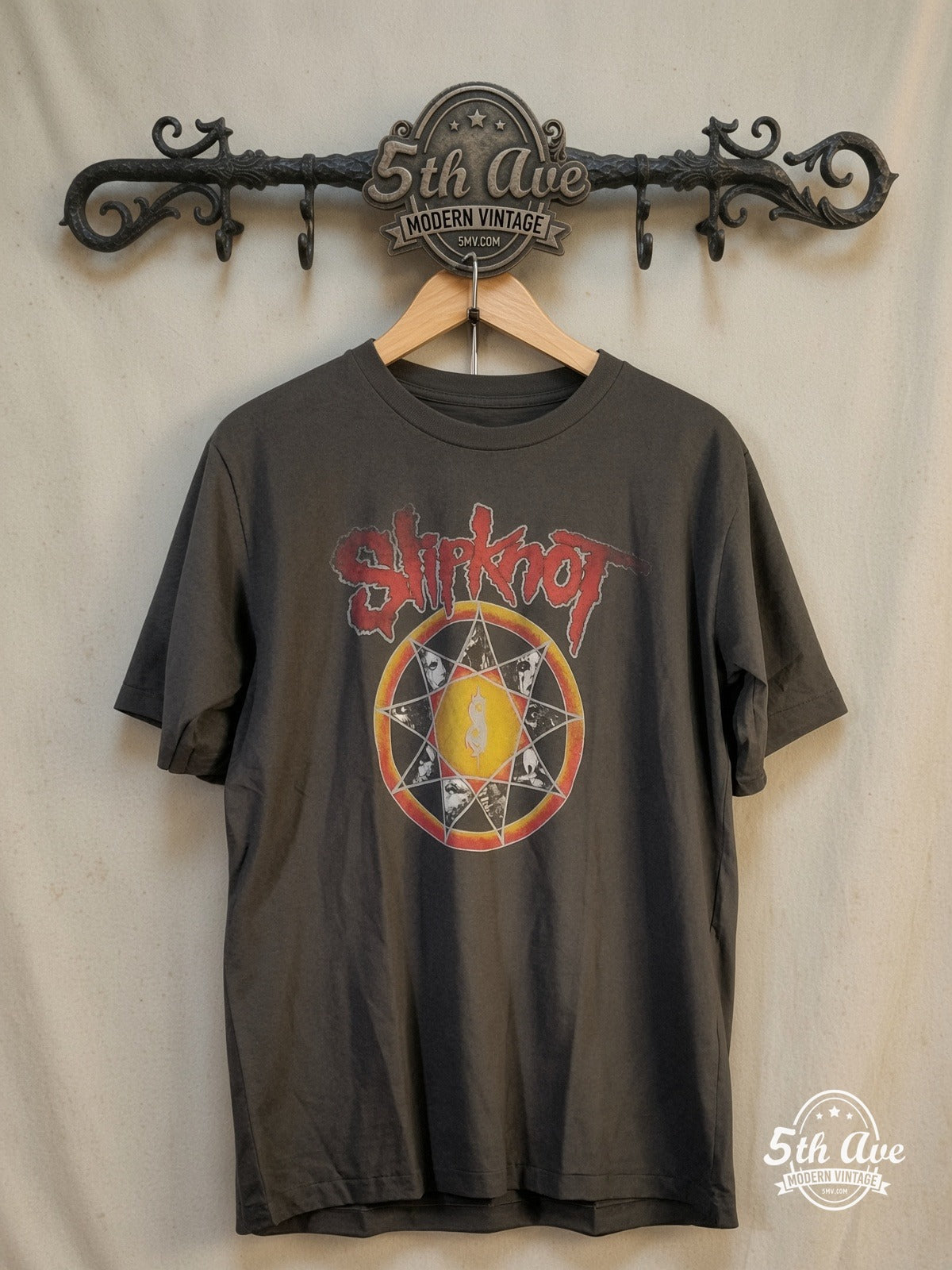 Slipknot – Nonagram Tribal S Member Portraits – Vintage Band T-Shirt — front on locked cream ornate 5th Ave rack