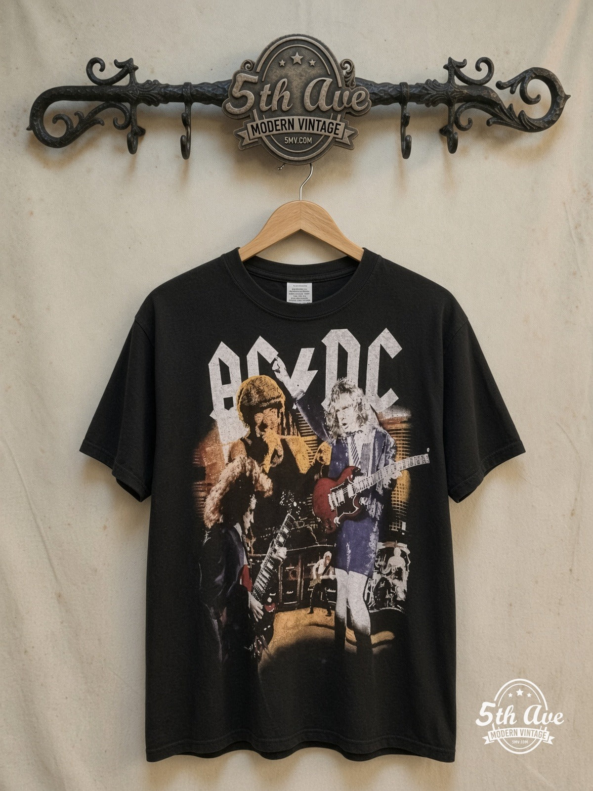 AC/DC – Thunderstruck Live – Vintage Band T-Shirt — front on locked cream ornate 5th Ave rack