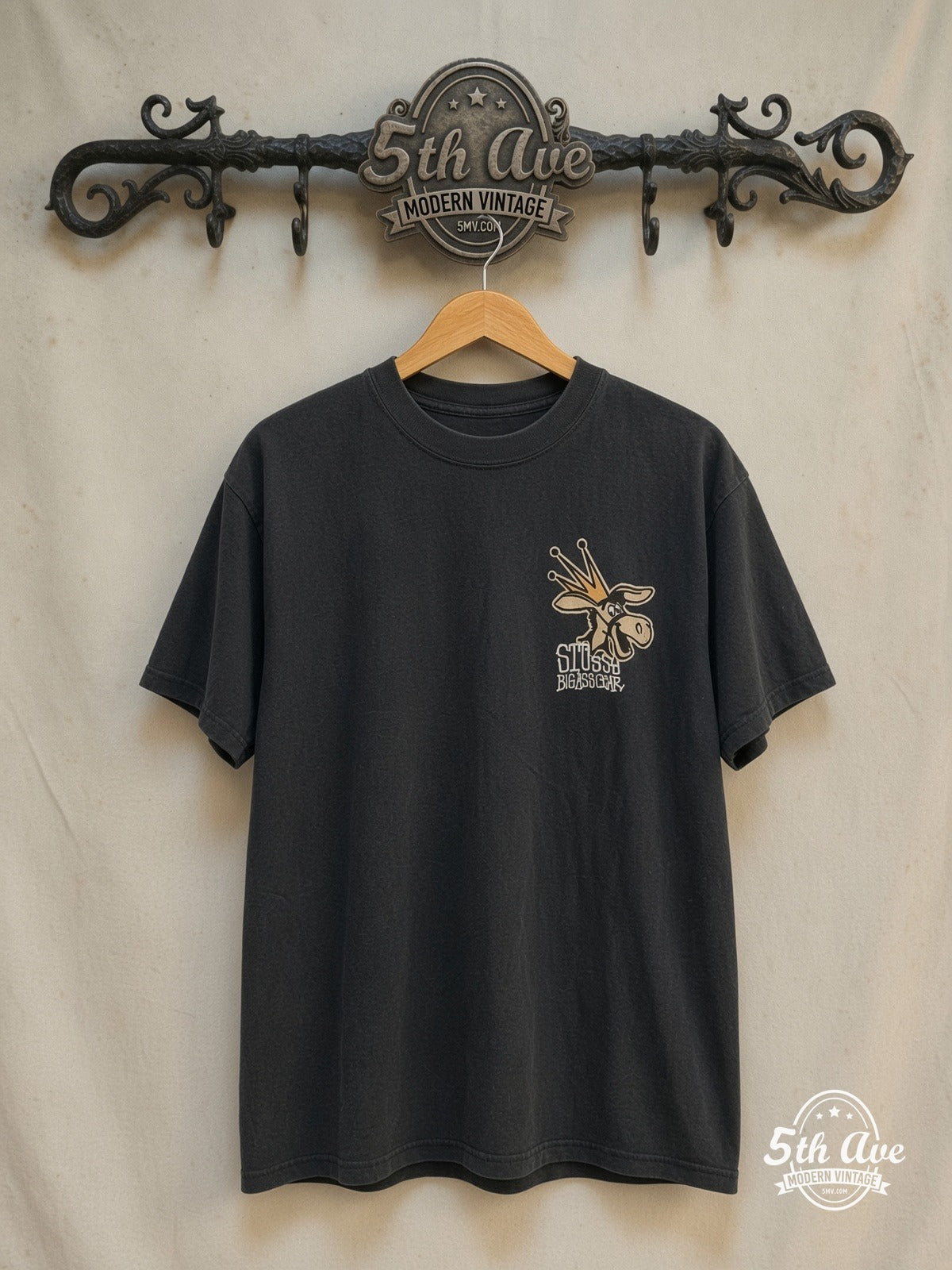 Stussy – Big Ass Gear – Vintage Graphic Tee front on locked cream ornate 5th Ave rack