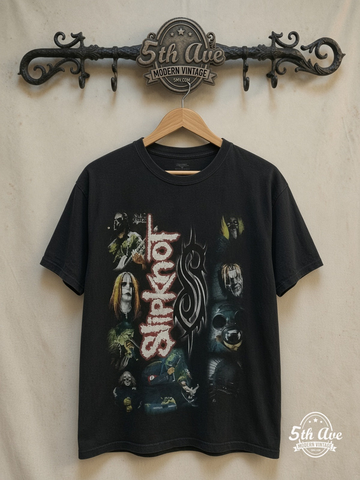 Slipknot – Vertical Logo Tribal S Mask Collage – Vintage Band T-Shirt — front on locked cream ornate 5th Ave rack