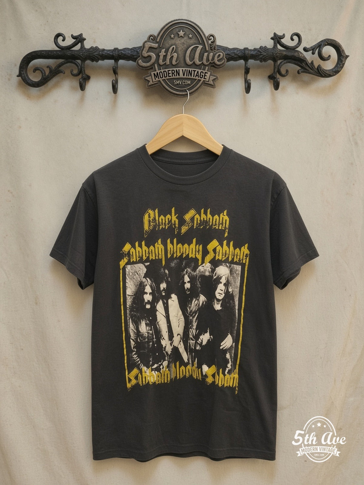Resonant Echoes: Sabbath Bloody Sabbath Distressed t shirt – Vintage Band T-Shirt — front on locked cream ornate 5th Ave rack