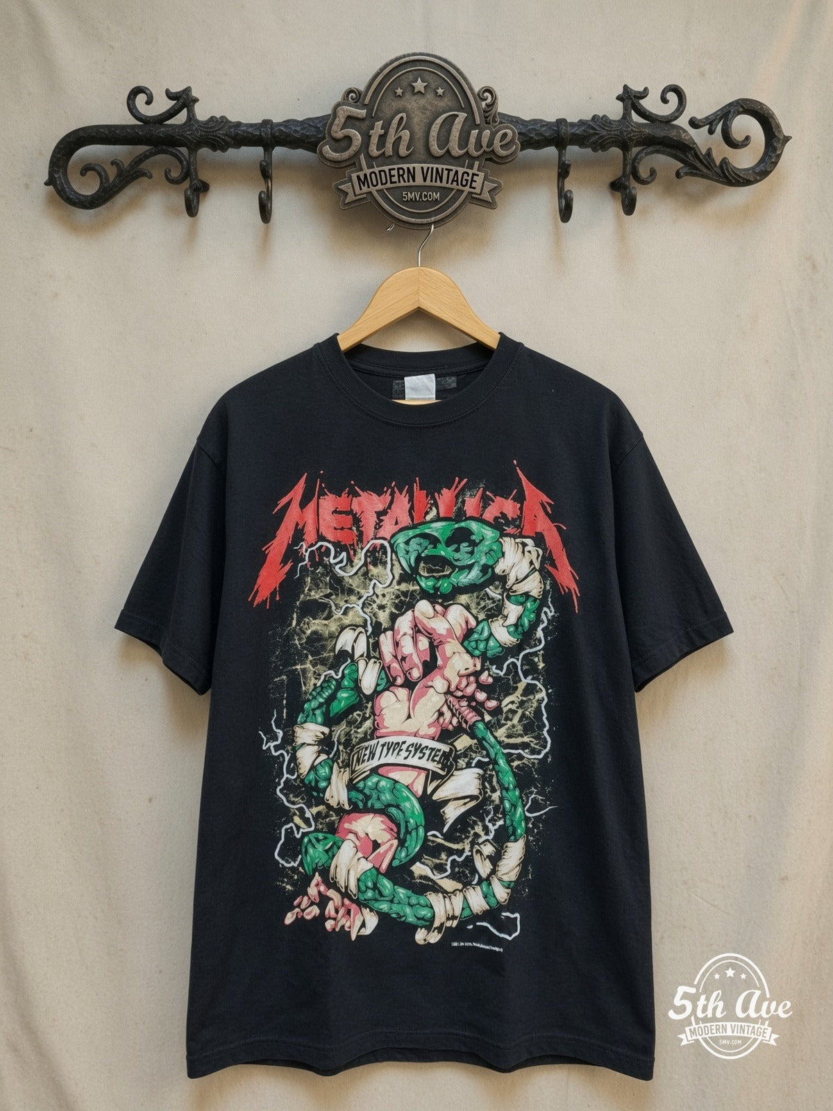 Metallica – New Type System Fist Green Snake – Vintage Band T-Shirt — front on locked cream ornate 5th Ave rack