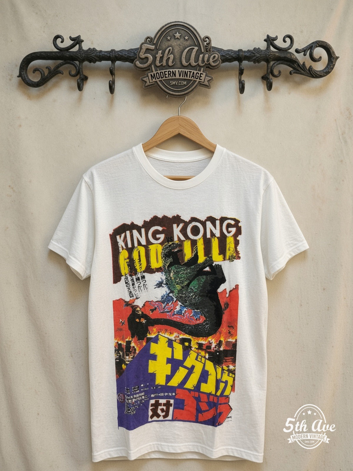 King Kong vs. Godzilla – 1962 – Vintage Movie Tee — front on locked cream ornate 5th Ave rack