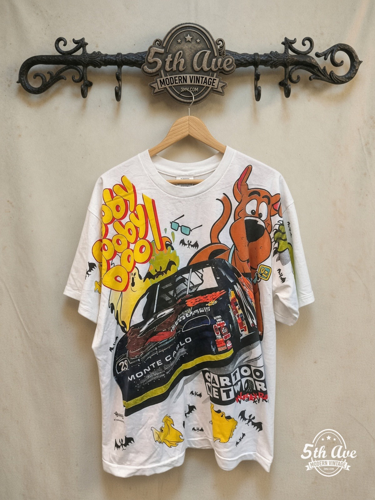 Scooby-Doo – NASCAR Monte Carlo Mysteries – New Vintage Graphic Tee — front on locked cream ornate 5th Ave rack