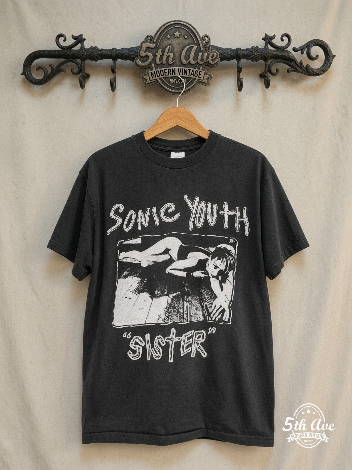 Sonic Youth – Sister 1987 – Vintage Band T-Shirt — front on locked cream ornate 5th Ave rack