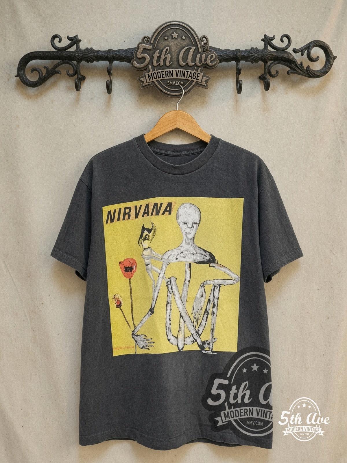 Nirvana – Incesticide' [Fudge Packin, Crack Smokin, Satan Worshippin, Motherfuck – Vintage Band T-Shirt — front on locked cream ornate 5th Ave rack