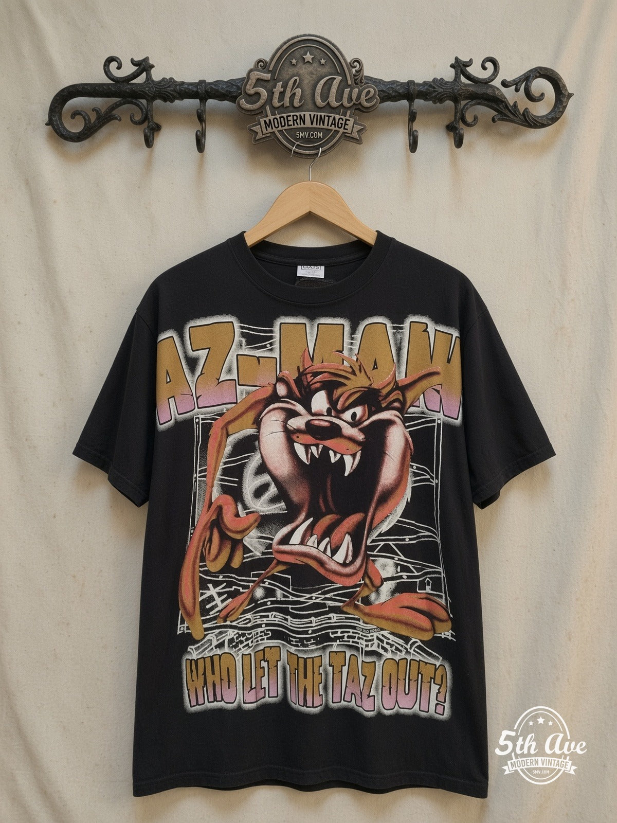 Looney Tunes – Taz-Mania Who Let The Taz Out? - AOP all over print New Vintage Animat – New Vintage Graphic Tee — front on locked cream ornate 5th Ave rack