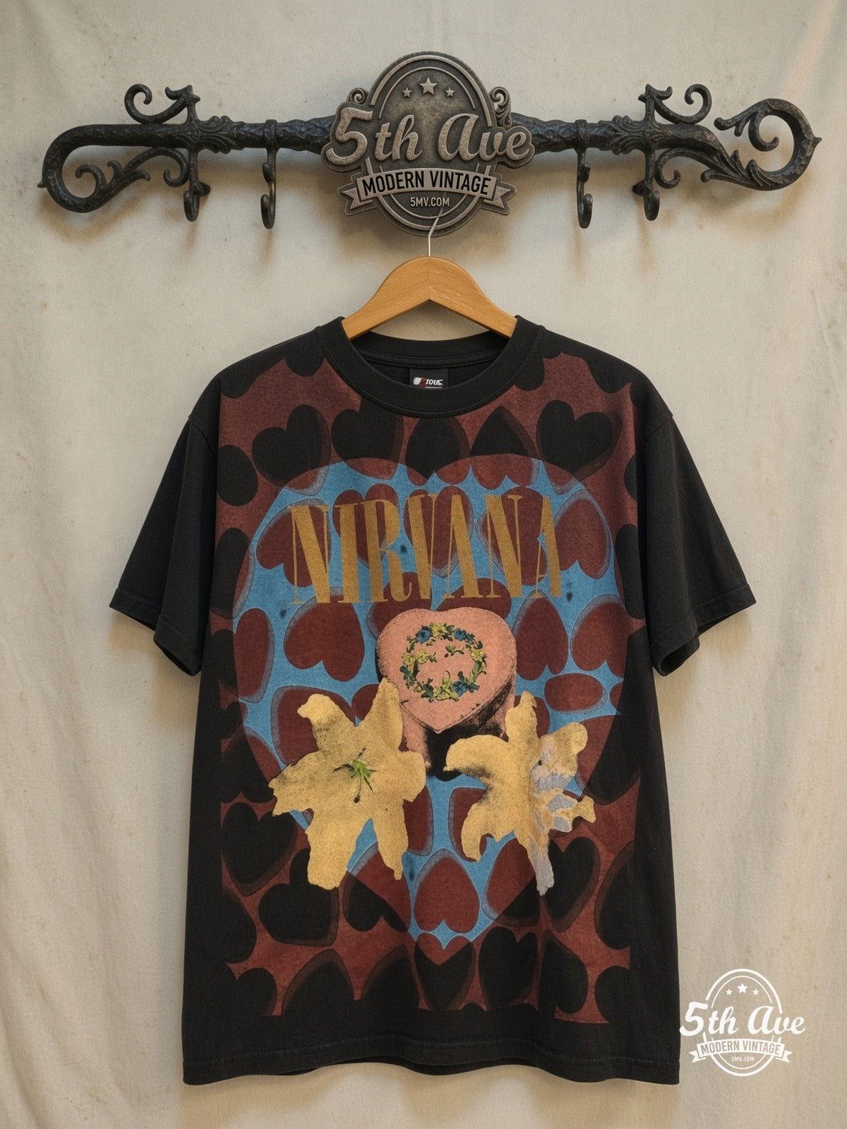 Nirvana – Heart-Shaped Box All Over Print T-Shirt – Vintage Band T-Shirt — front on locked cream ornate 5th Ave rack