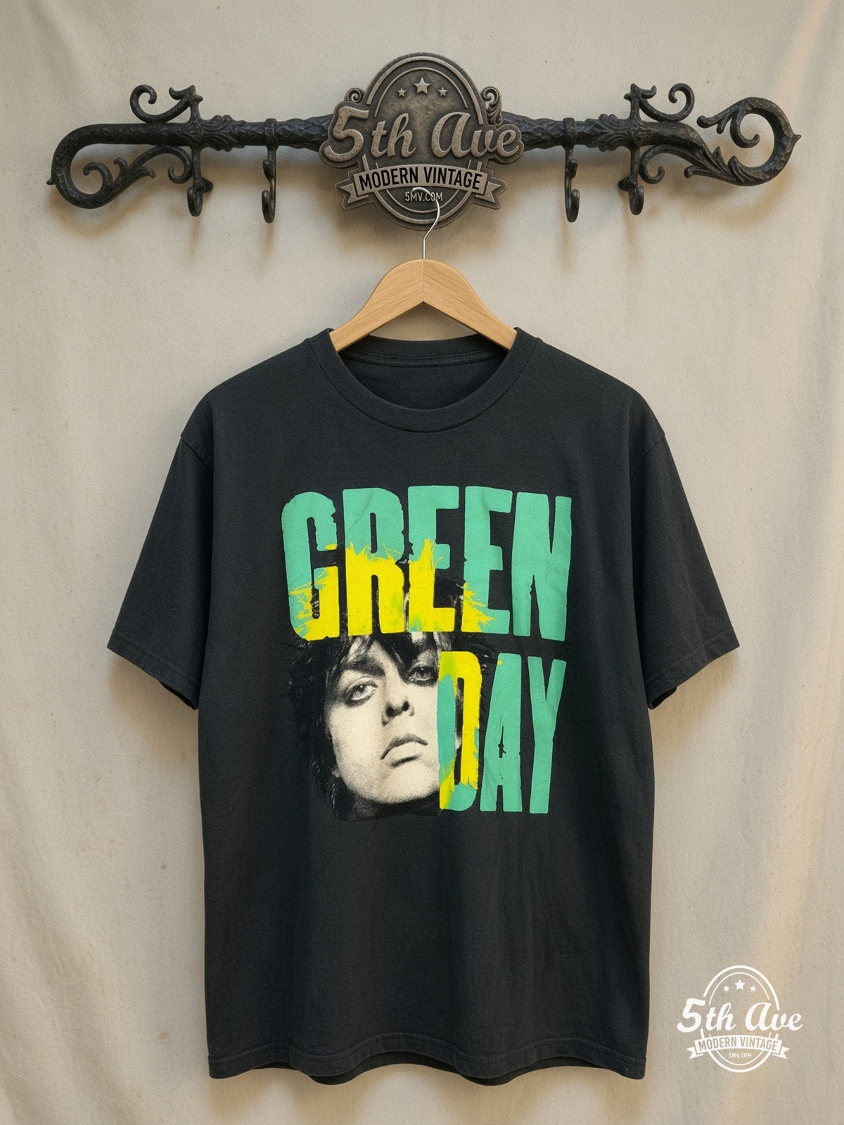 Green Day – Billie Joe Portrait Teal Yellow Splash – Vintage Band T-Shirt — front on locked cream ornate 5th Ave rack
