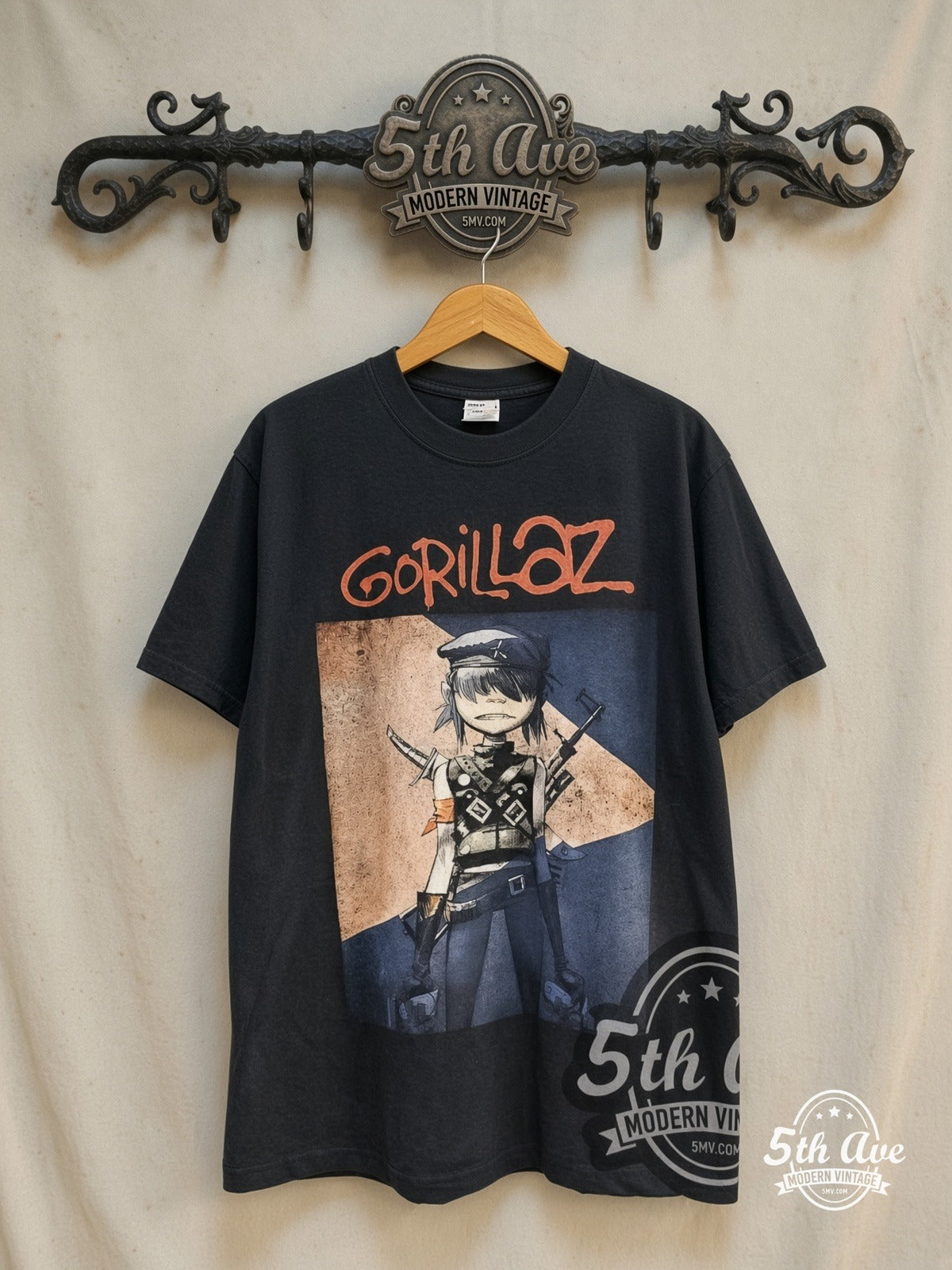 Gorillaz – World Tour – Vintage Band T-Shirt — front on locked cream ornate 5th Ave rack