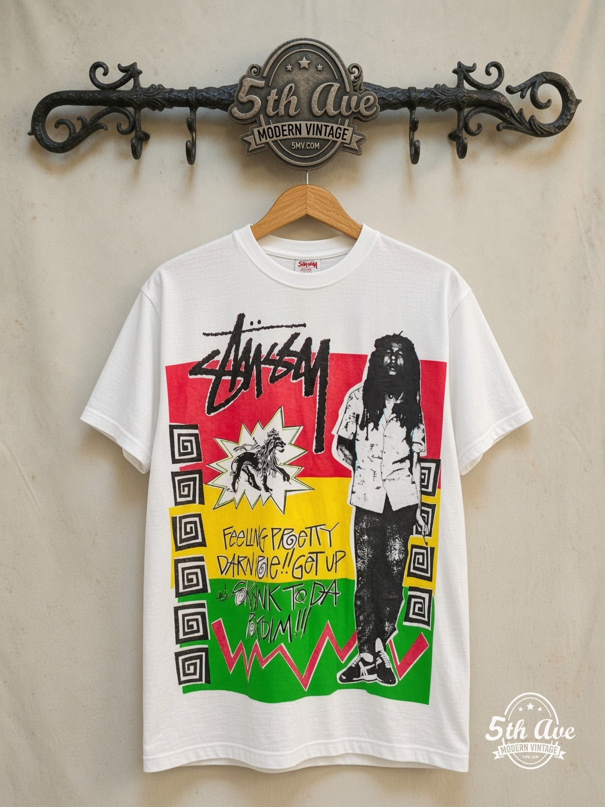 Bob Marley – X Stüssy – Vintage Band T-Shirt — front on locked cream ornate 5th Ave rack