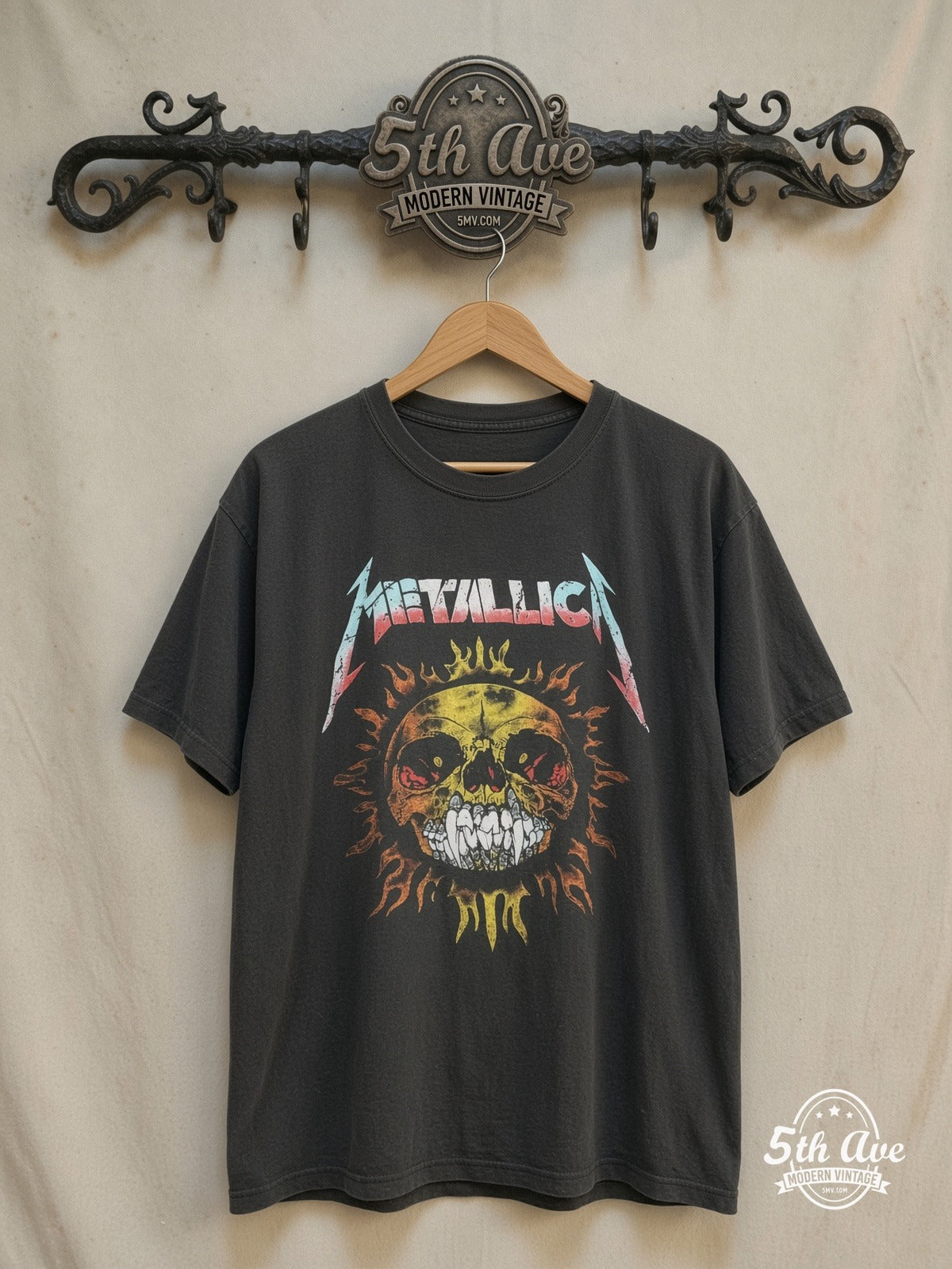 Metallica – Pushead Skull and Flaming Skull – Vintage Band T-Shirt — front on locked cream ornate 5th Ave rack