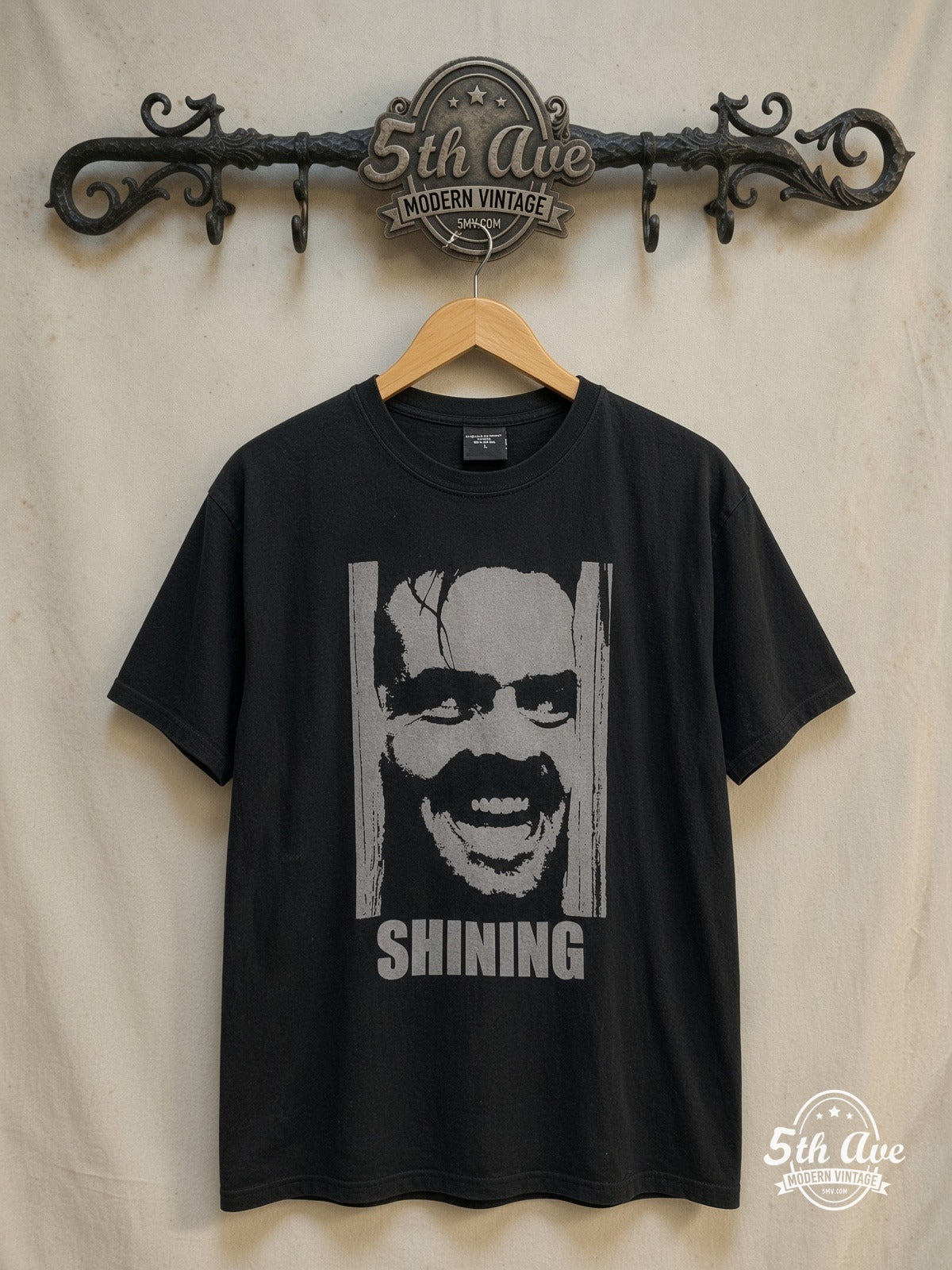 The Shining – Jack Torrance – Vintage Movie Tee — front on locked cream ornate 5th Ave rack
