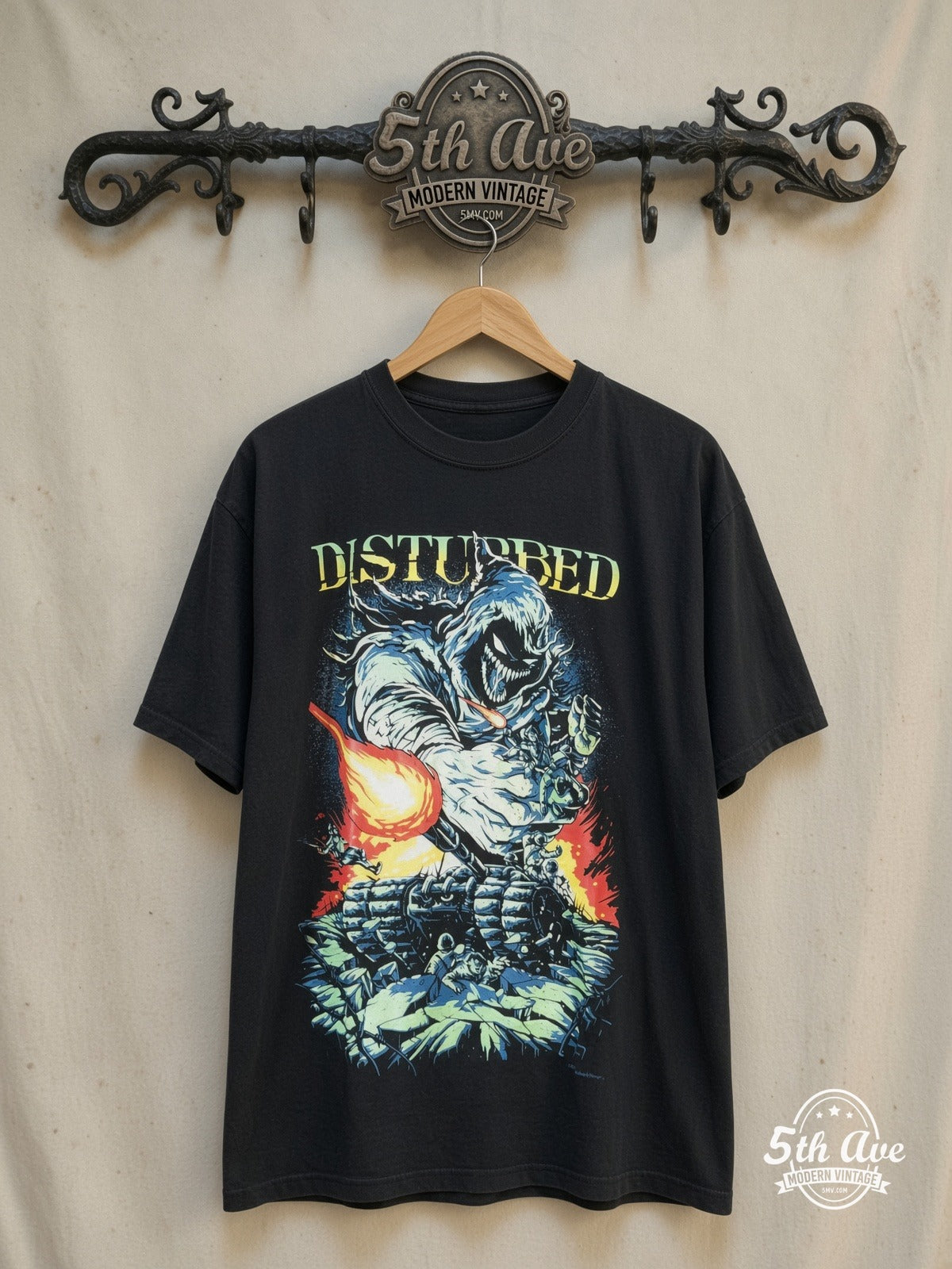 Disturbed Monstrous Resonance t shirt – Vintage Band T-Shirt — front on locked cream ornate 5th Ave rack